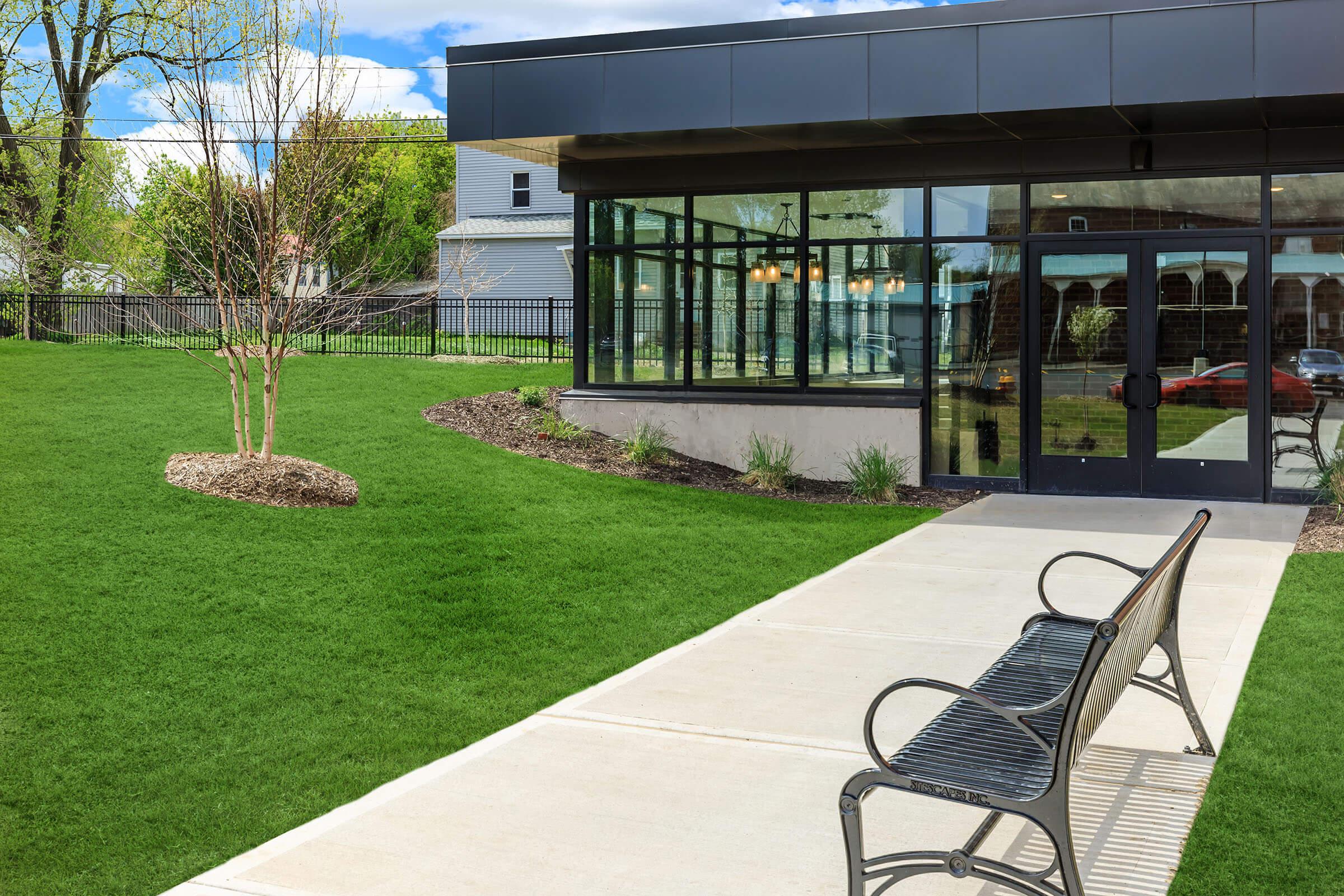 a large lawn in front of a building