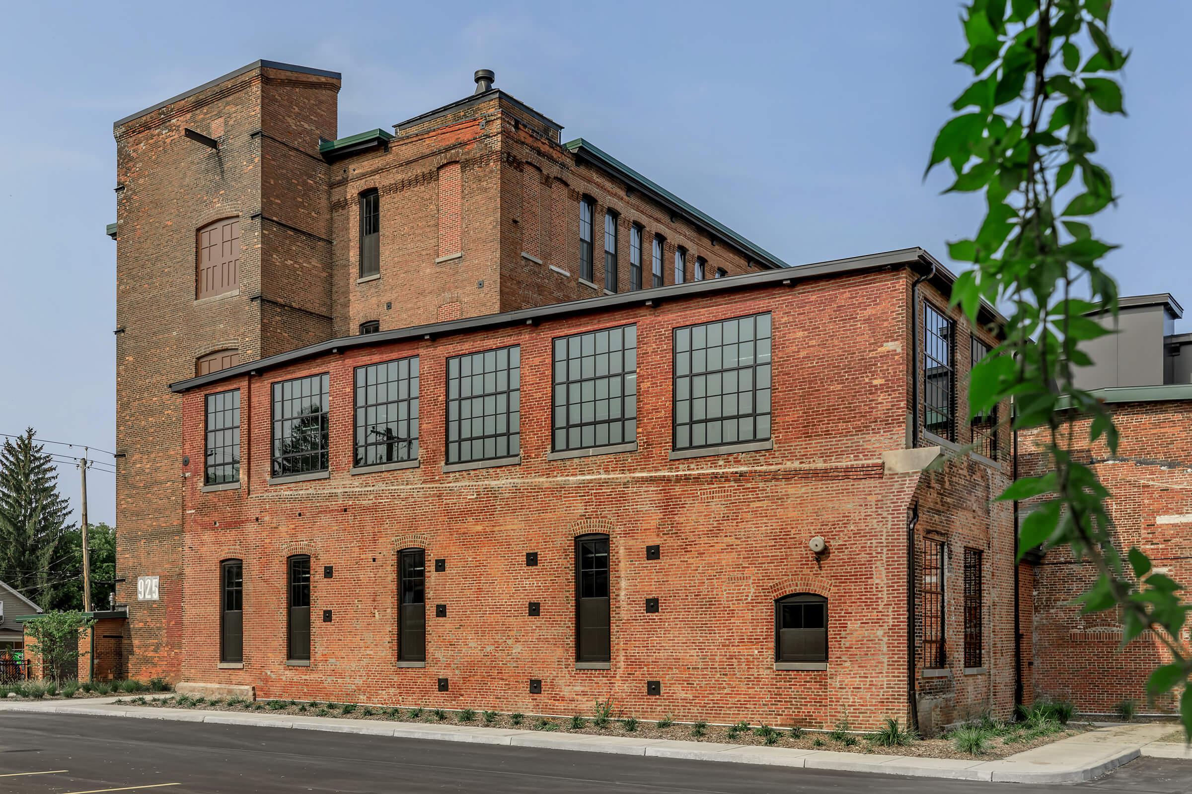 a large brick building with Stonewall Jackson House in the background