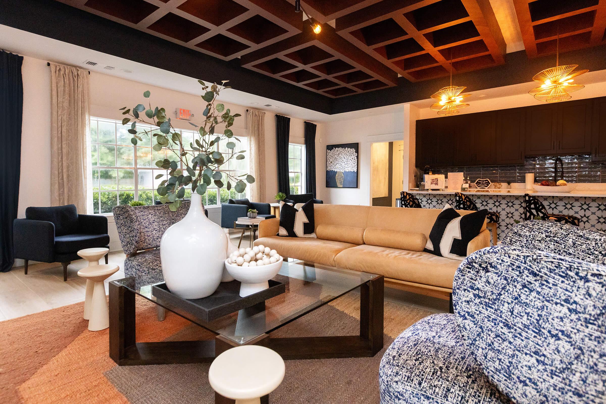 a living room filled with furniture and a fire place