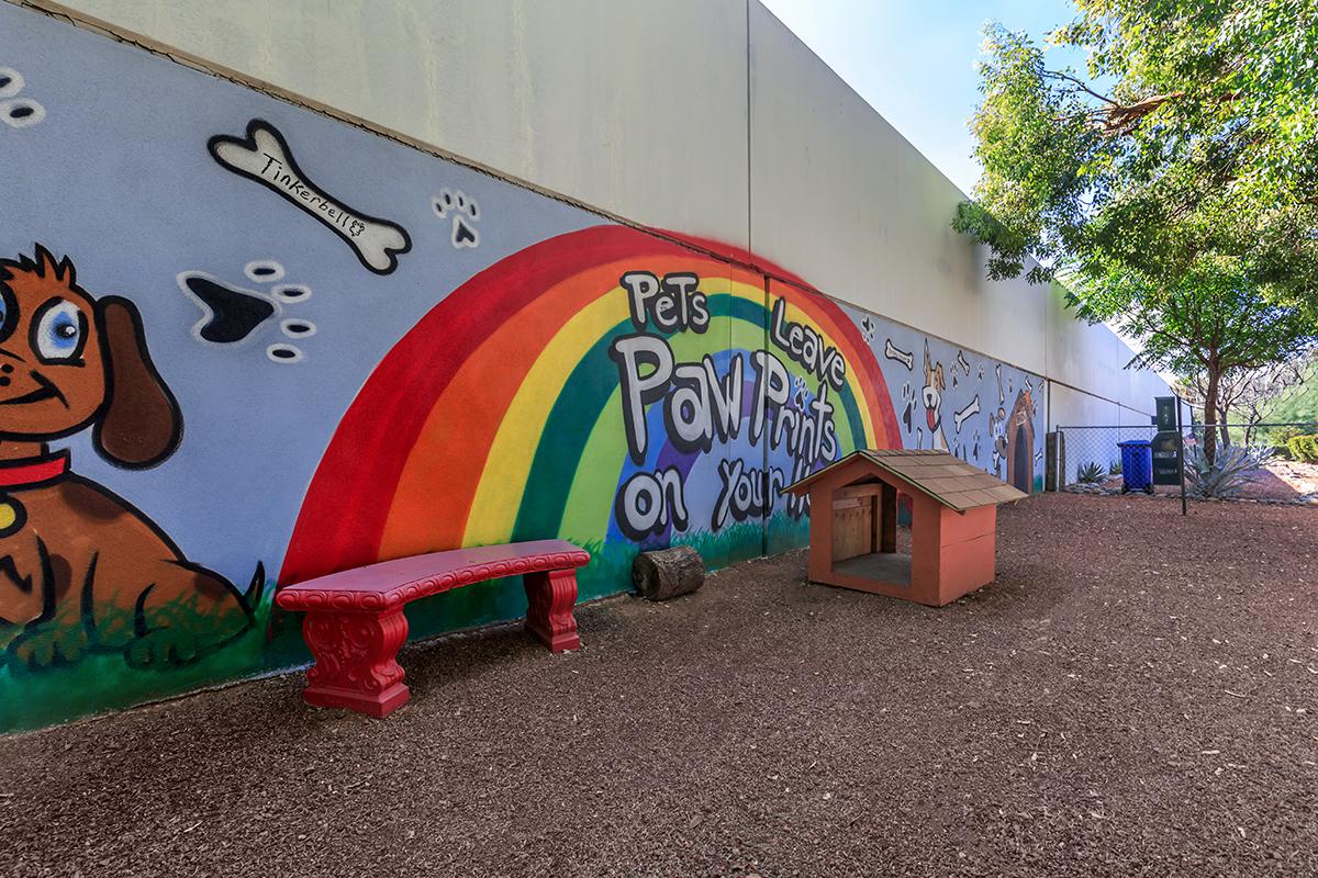 a girl in a parking lot painted with graffiti