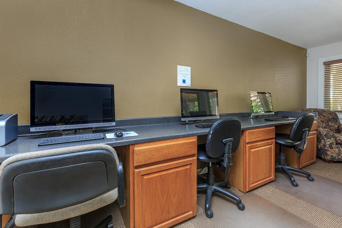 a room filled with furniture and a flat screen tv