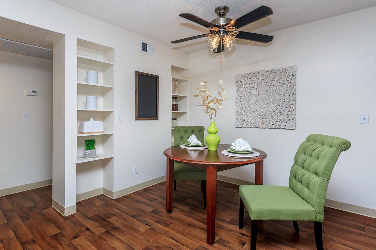 a living room with a wooden floor