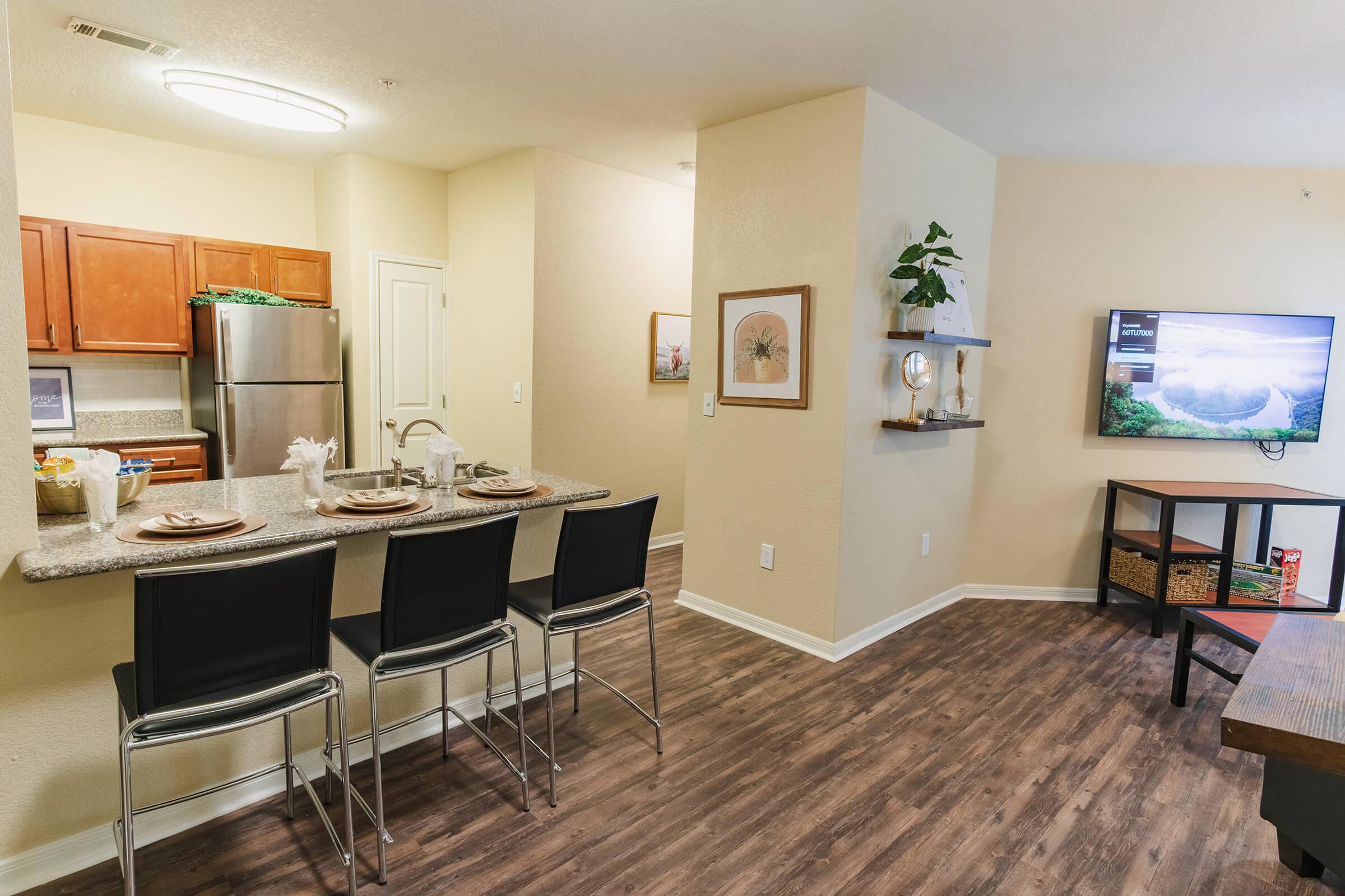 a room filled with furniture and a table