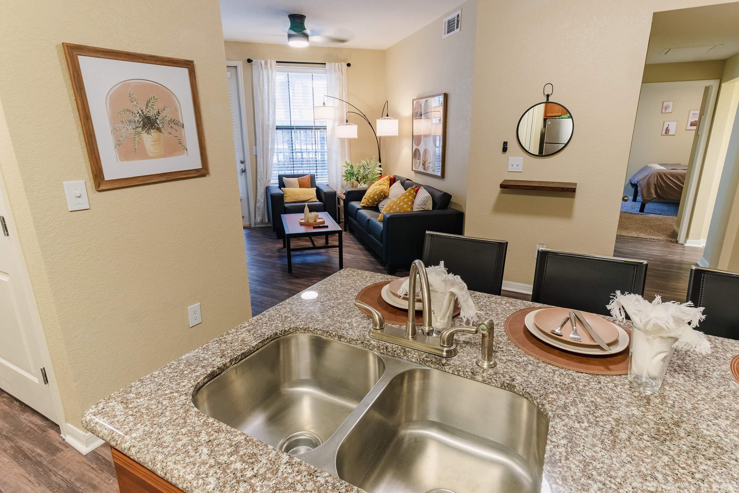 a kitchen with a sink and a counter