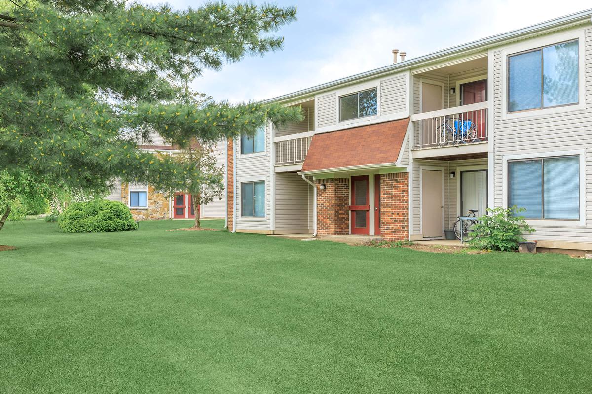 a large lawn in front of a house