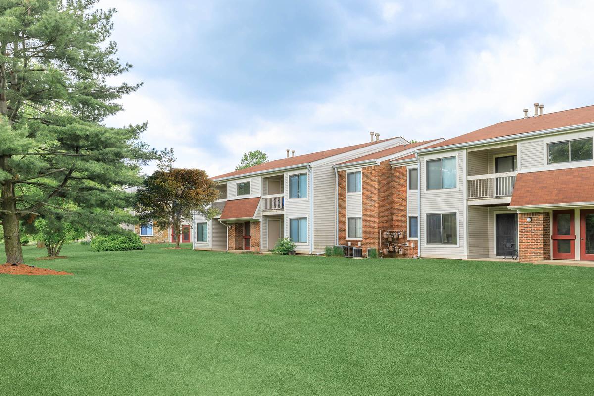 a large lawn in front of a house