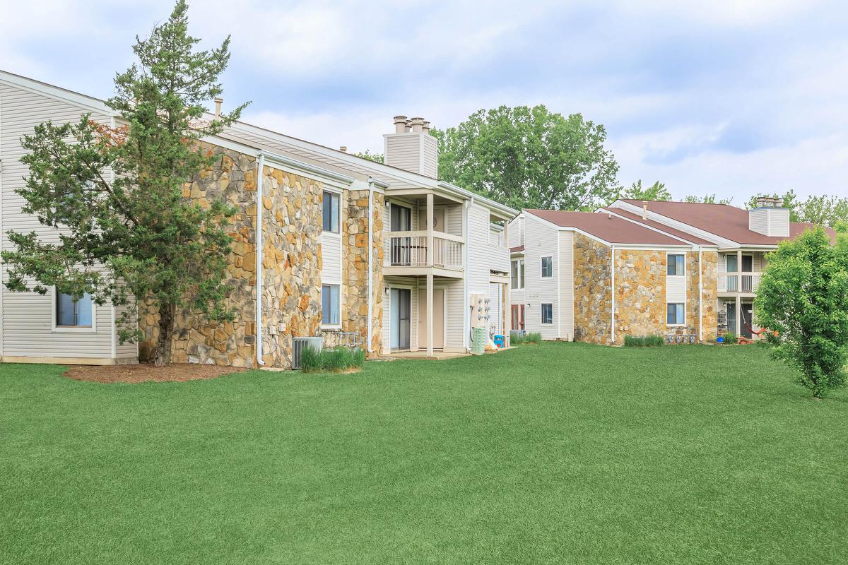 a large lawn in front of a house