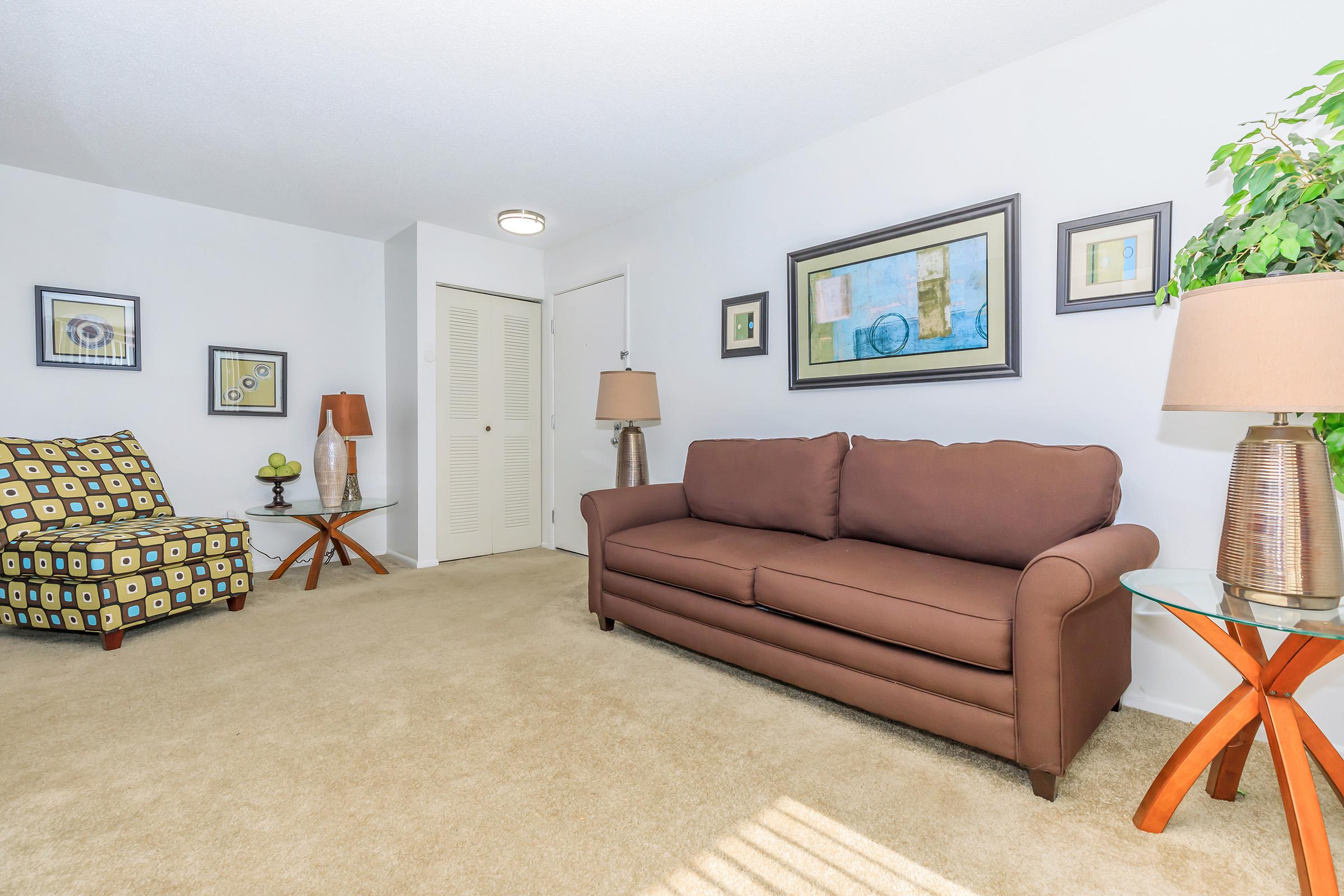 a living room with a wooden floor