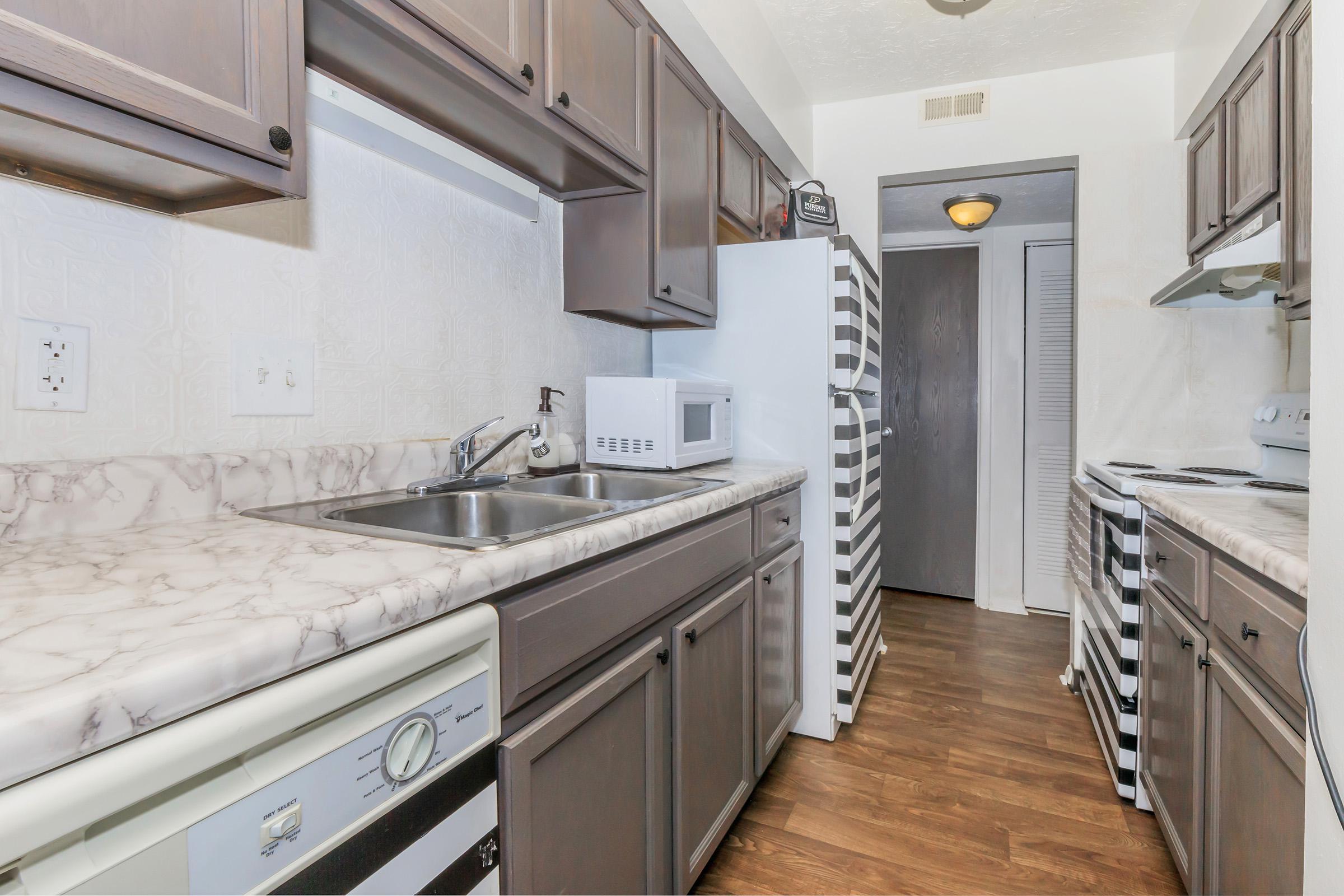 a kitchen with stainless steel appliances