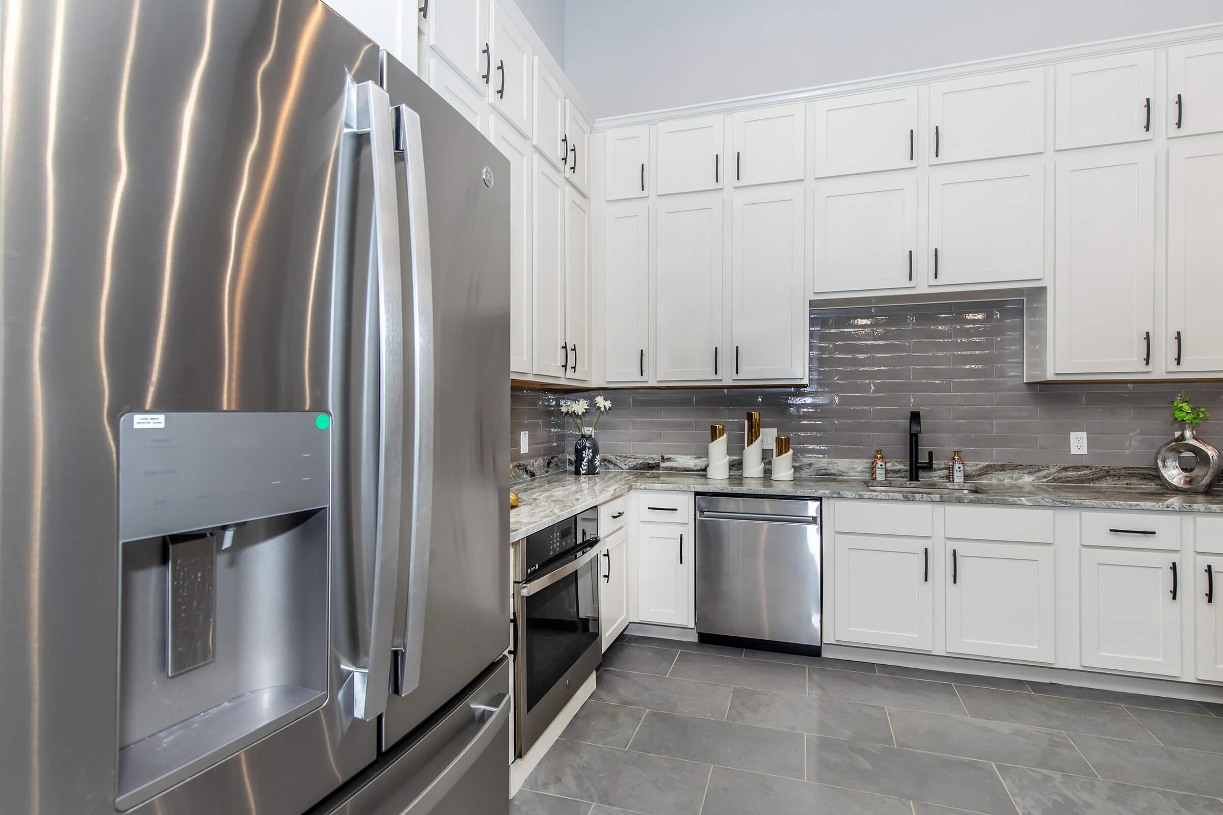 a kitchen with stainless steel appliances