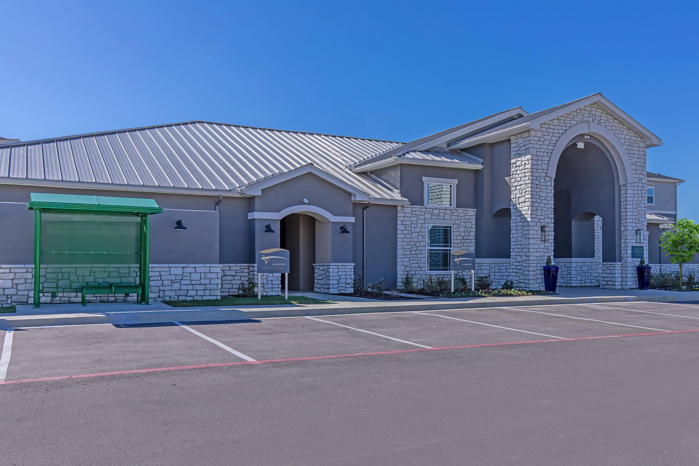 a building with a parking lot