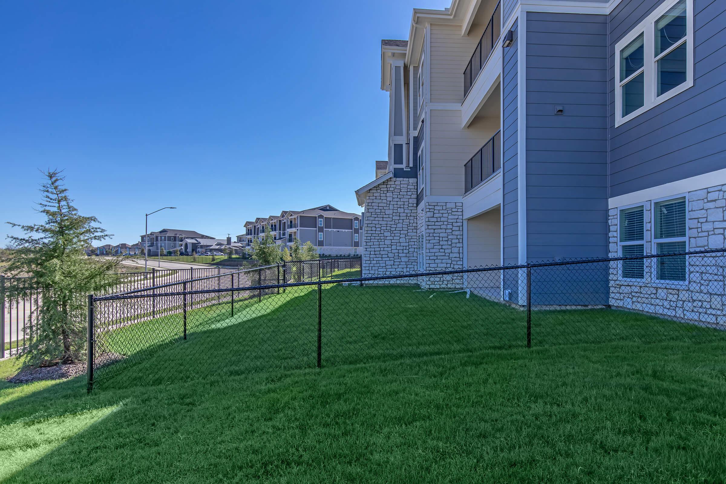 a large lawn in front of a building