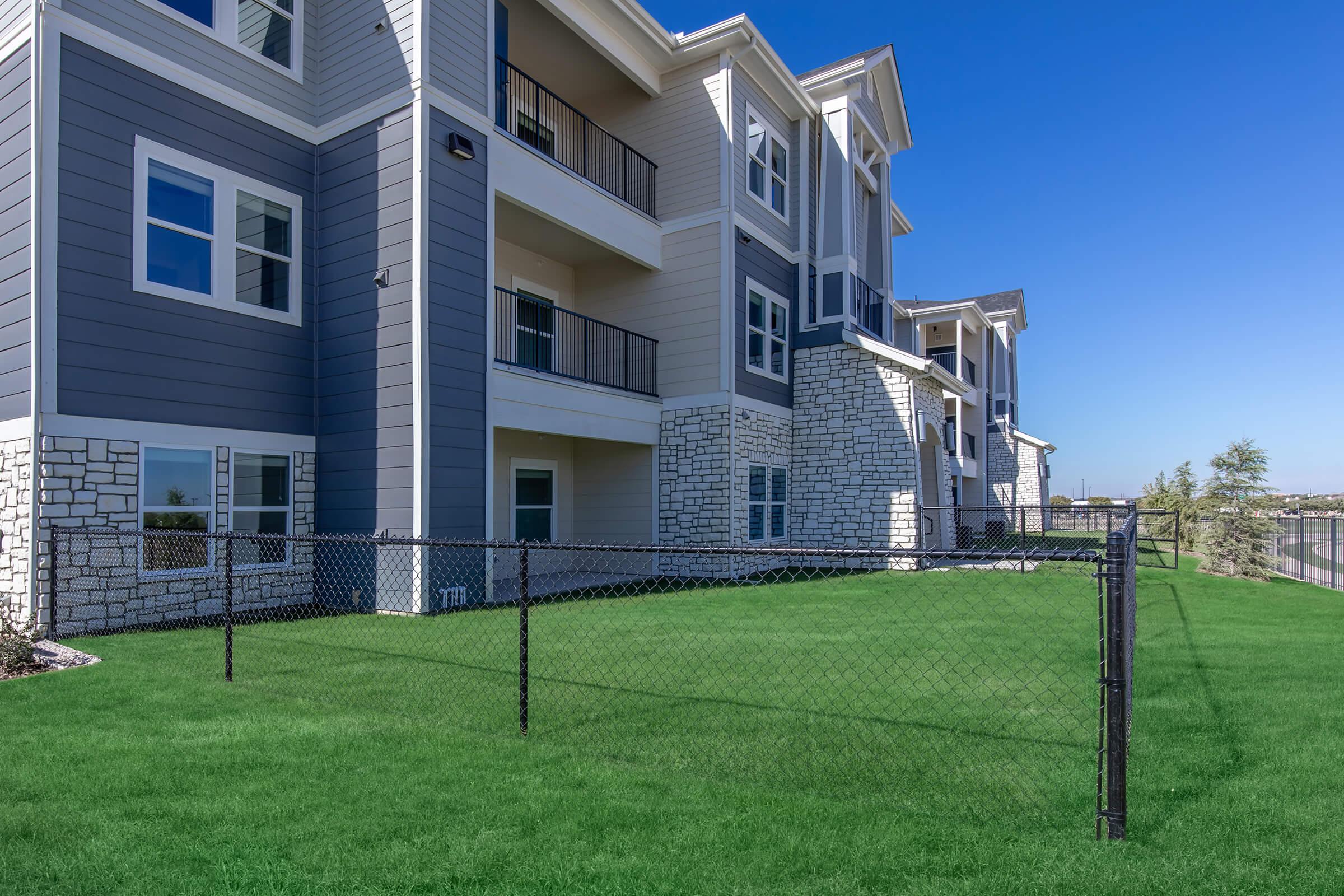 a large lawn in front of a building