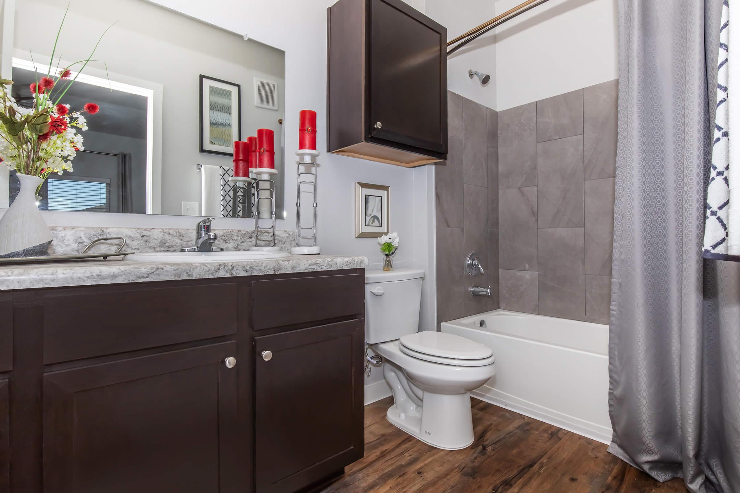 a room with a sink and a shower