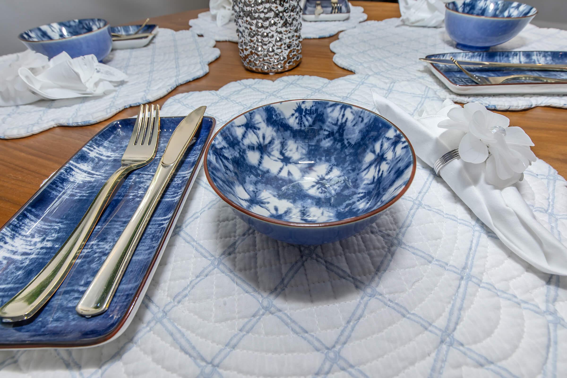 a table with a cake on a plate