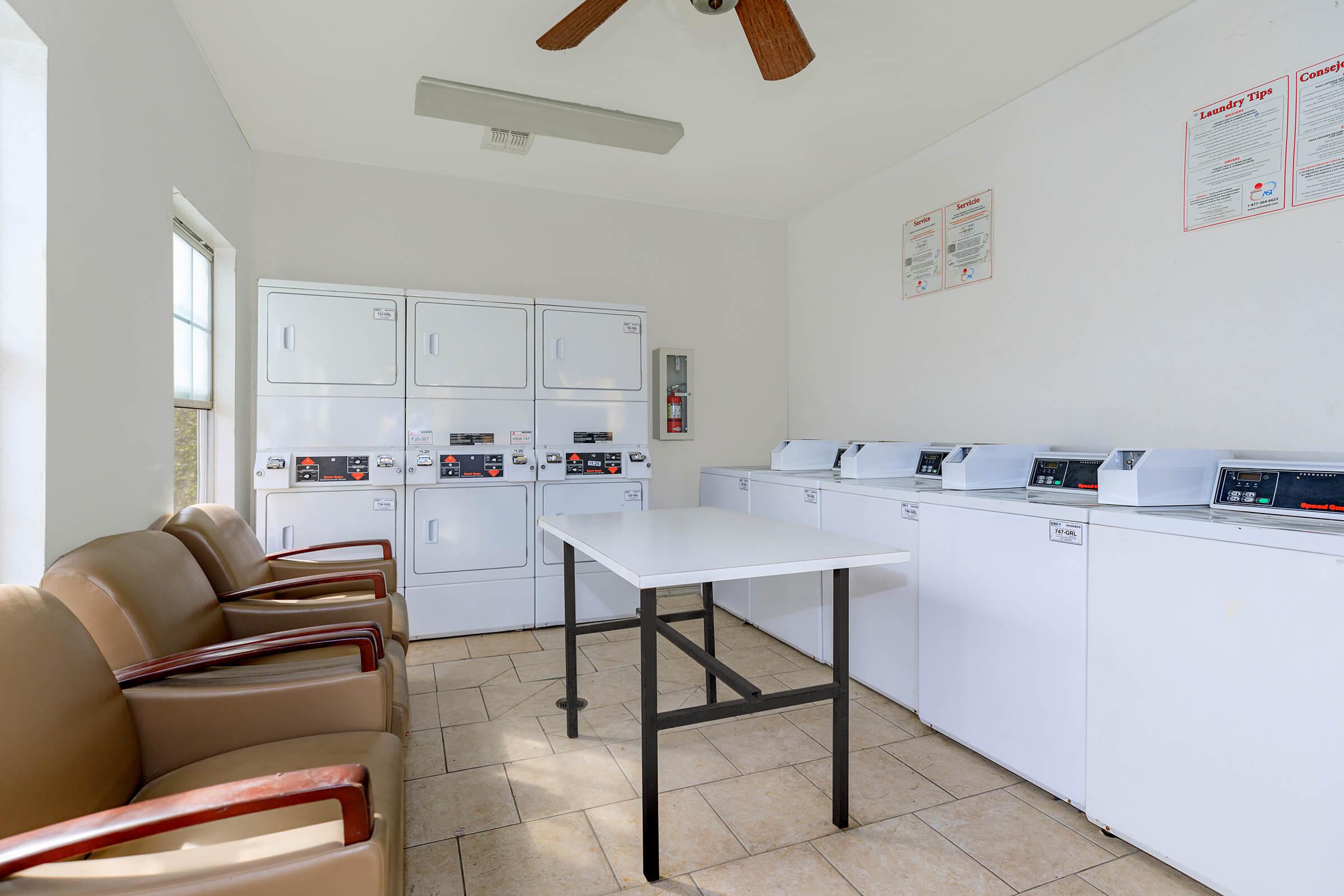 a kitchen with a table in a room