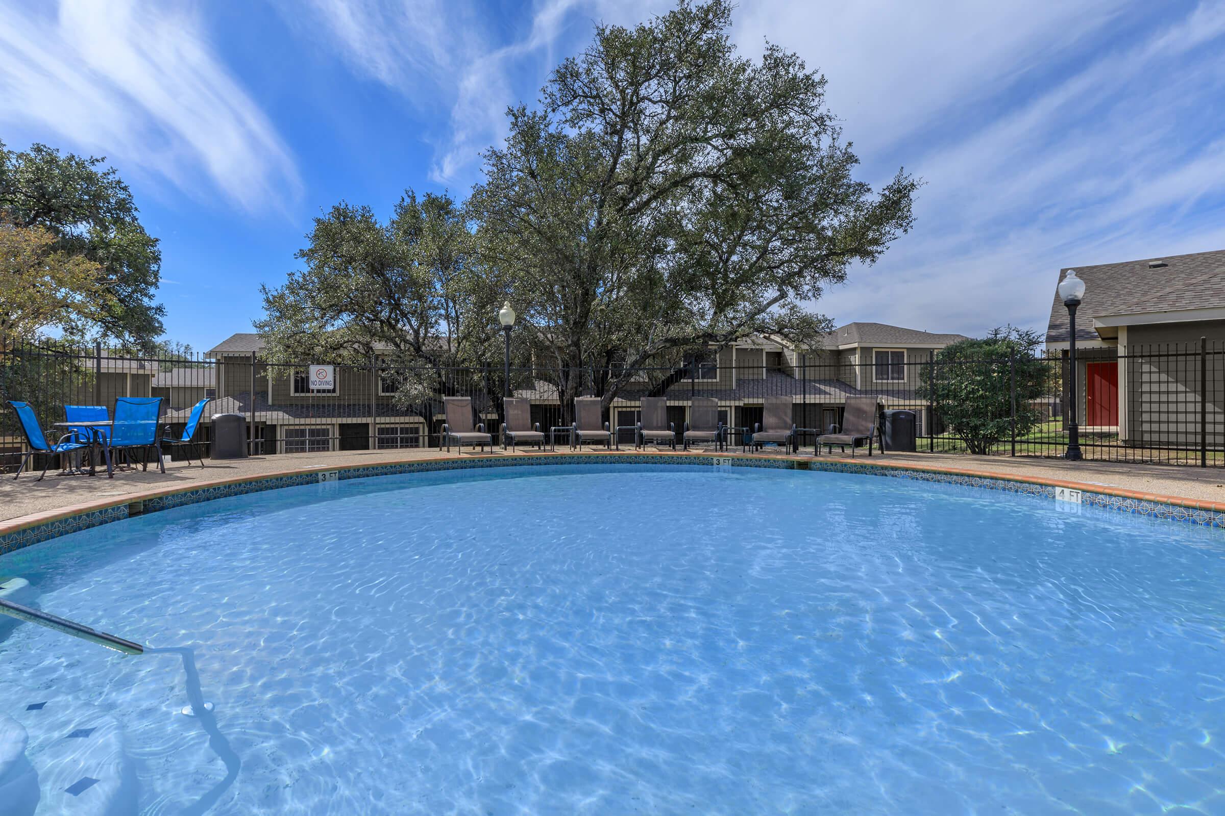 a pool next to a body of water