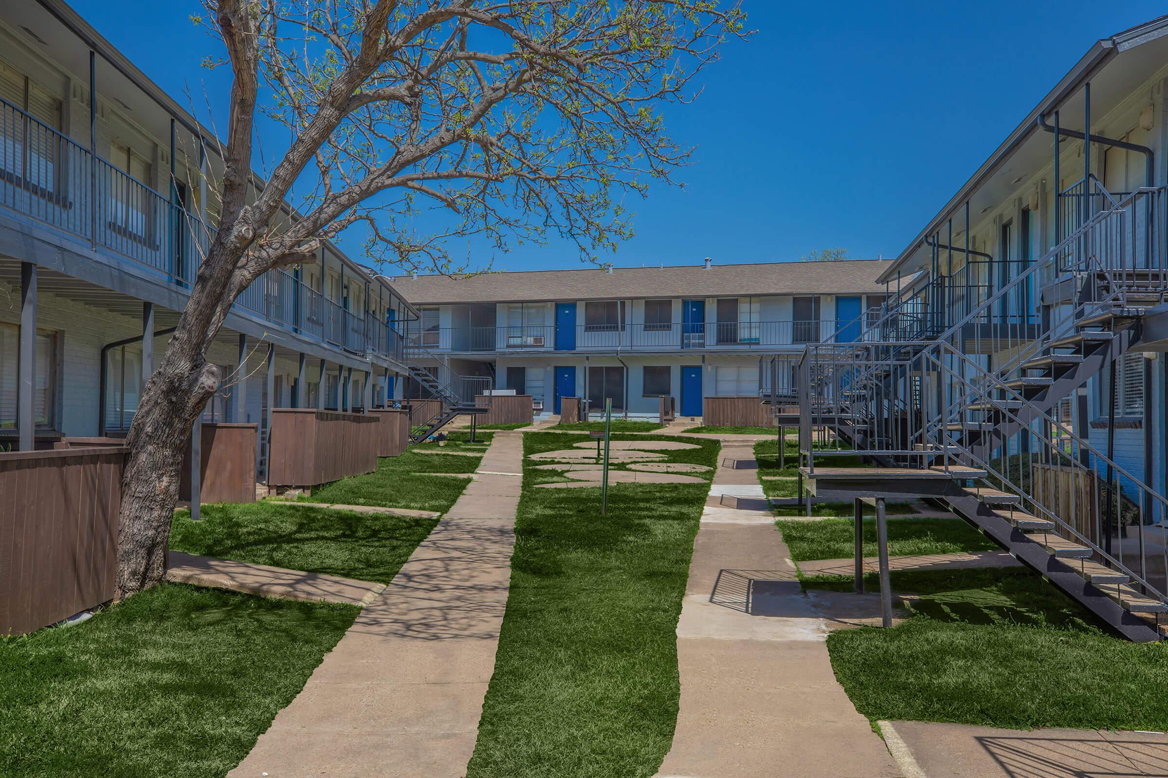 a large lawn in front of a building