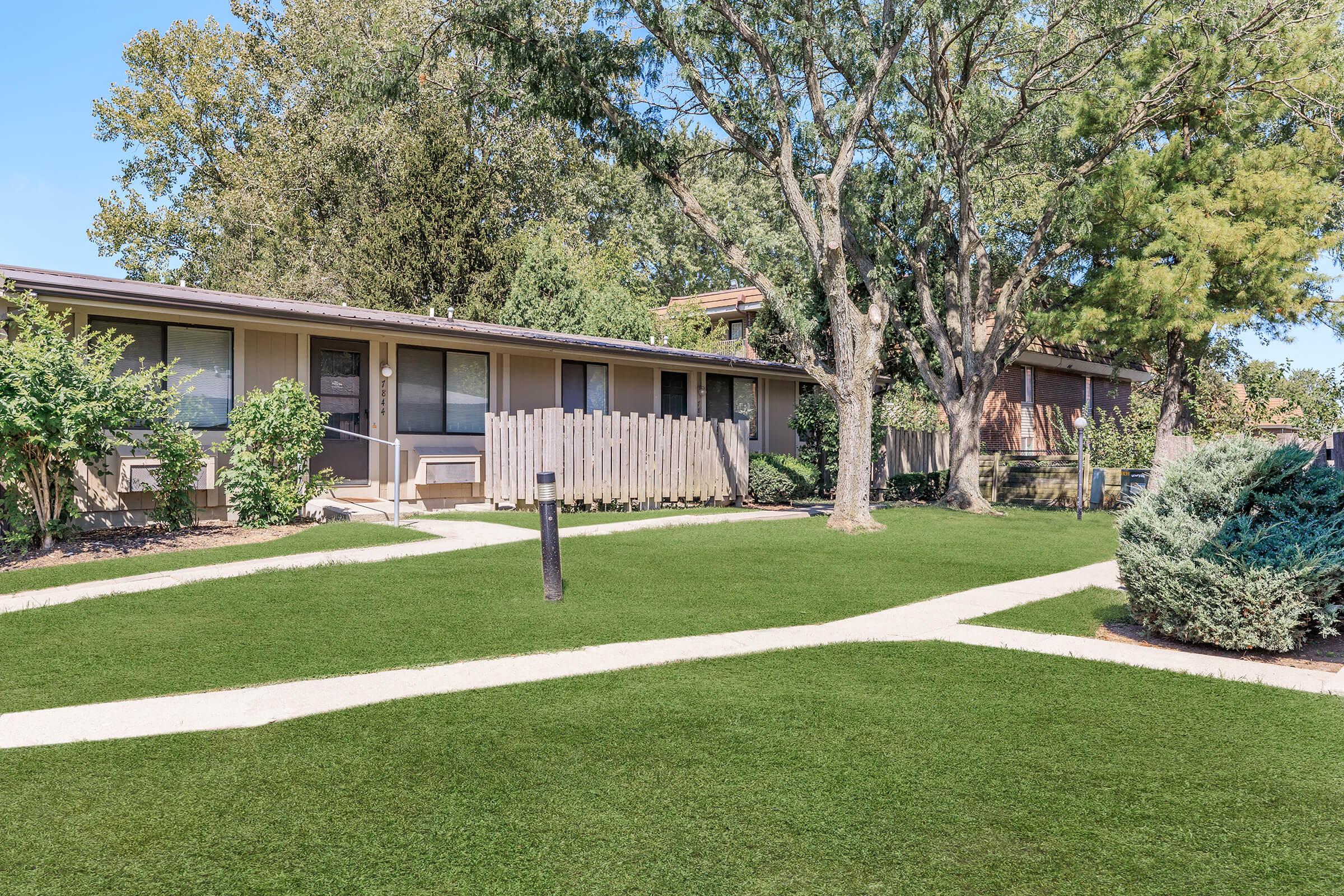 a large lawn in front of a house