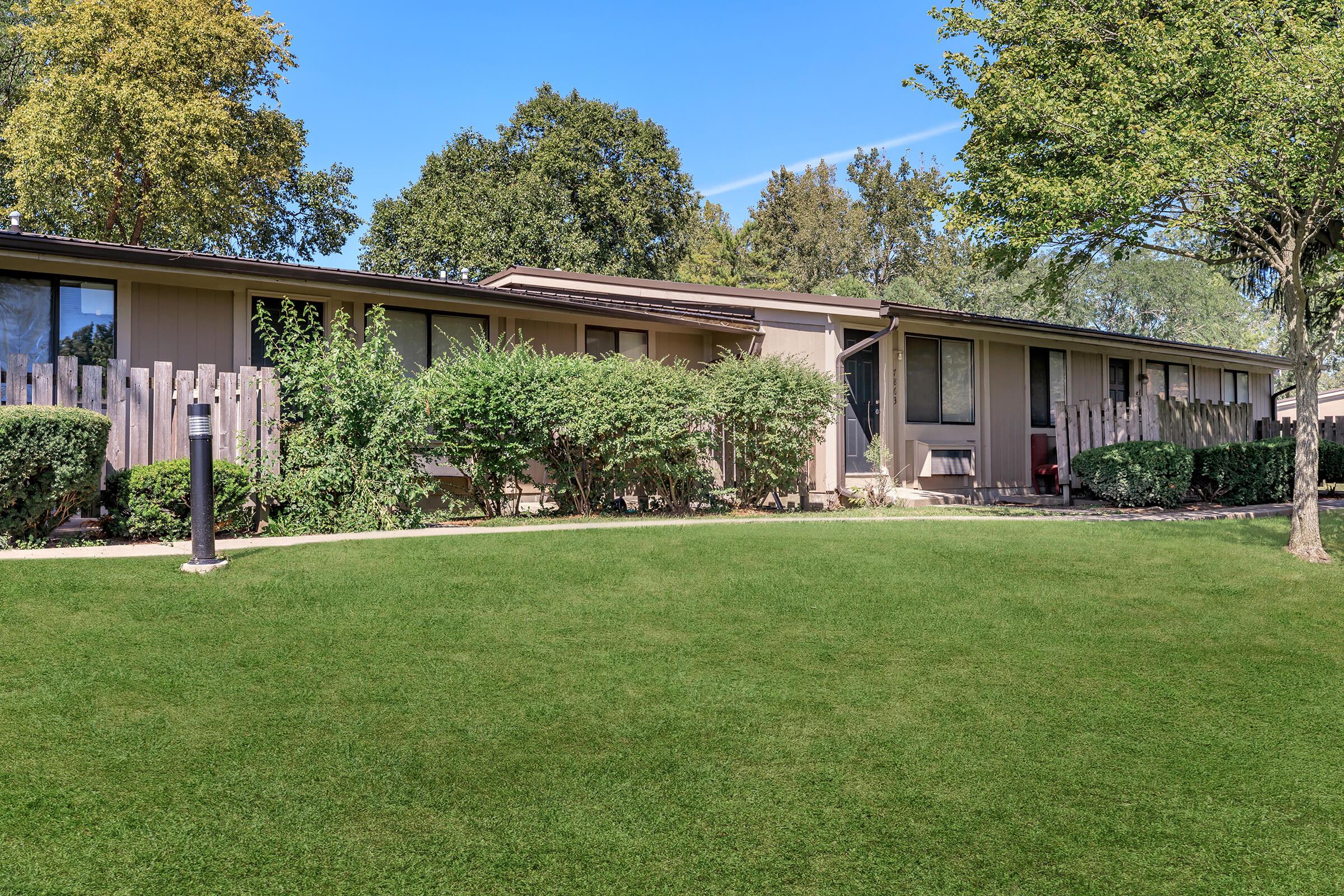 a large lawn in front of a house