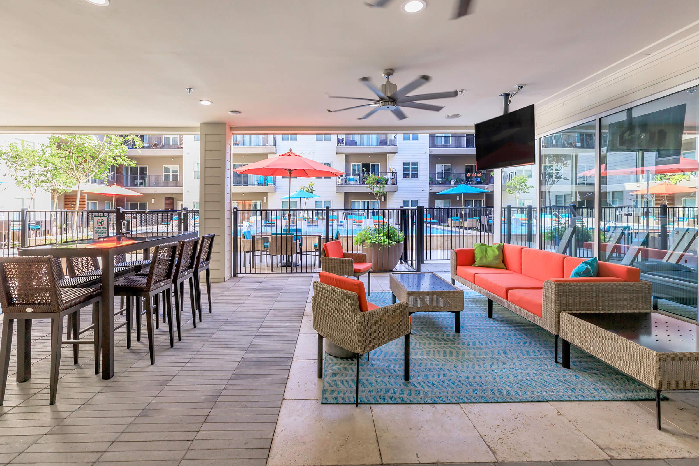 community patio with red chairs