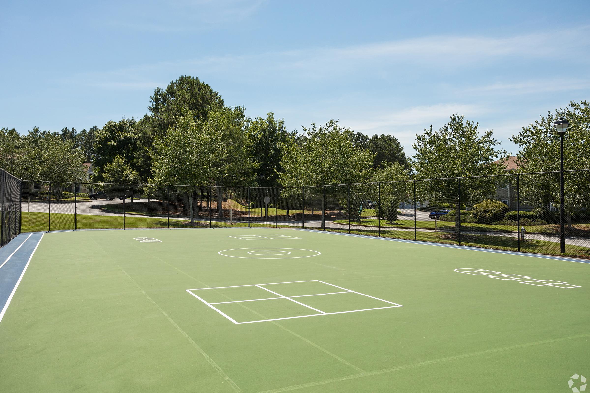 a person on a court with a racket