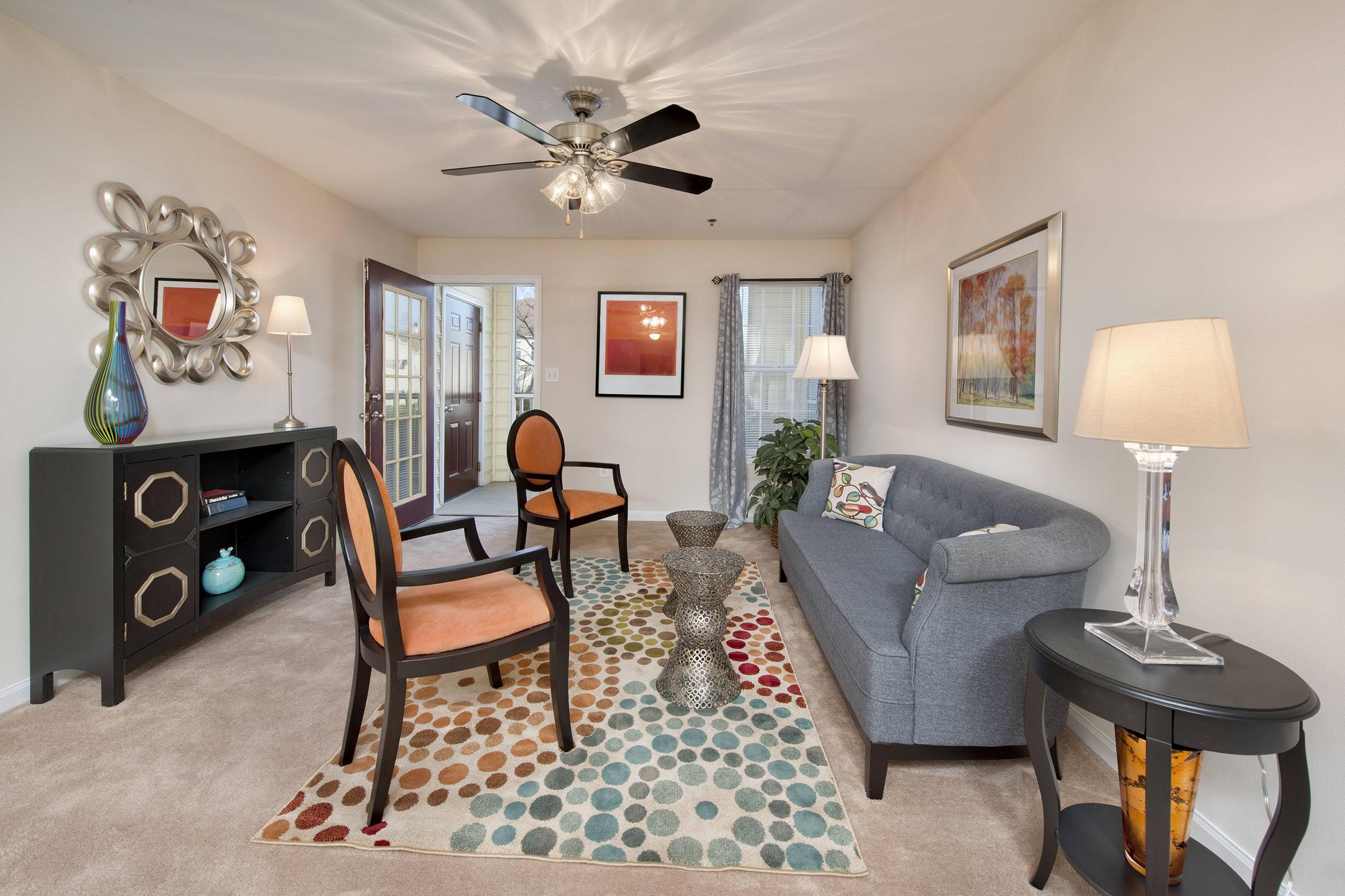 a living room with a leather chair