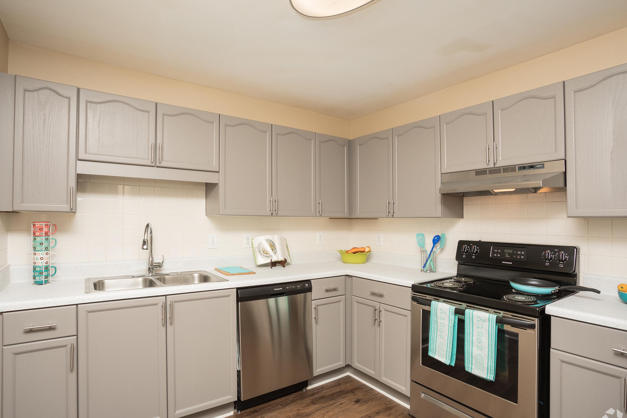 a modern kitchen with stainless steel appliances