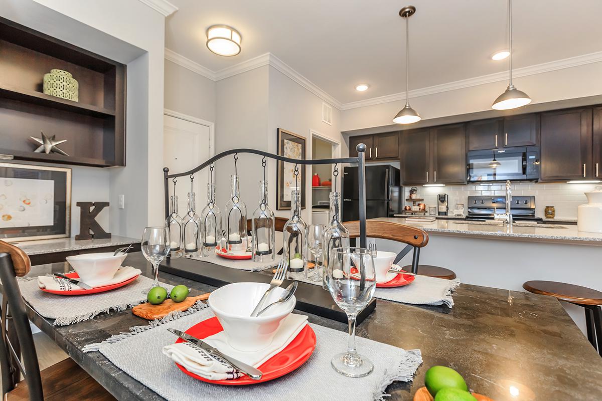 a kitchen with a dining table