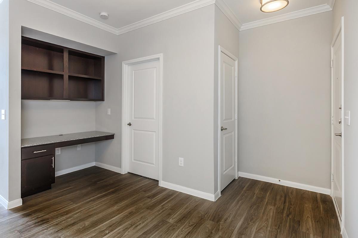 a kitchen with a wood floor