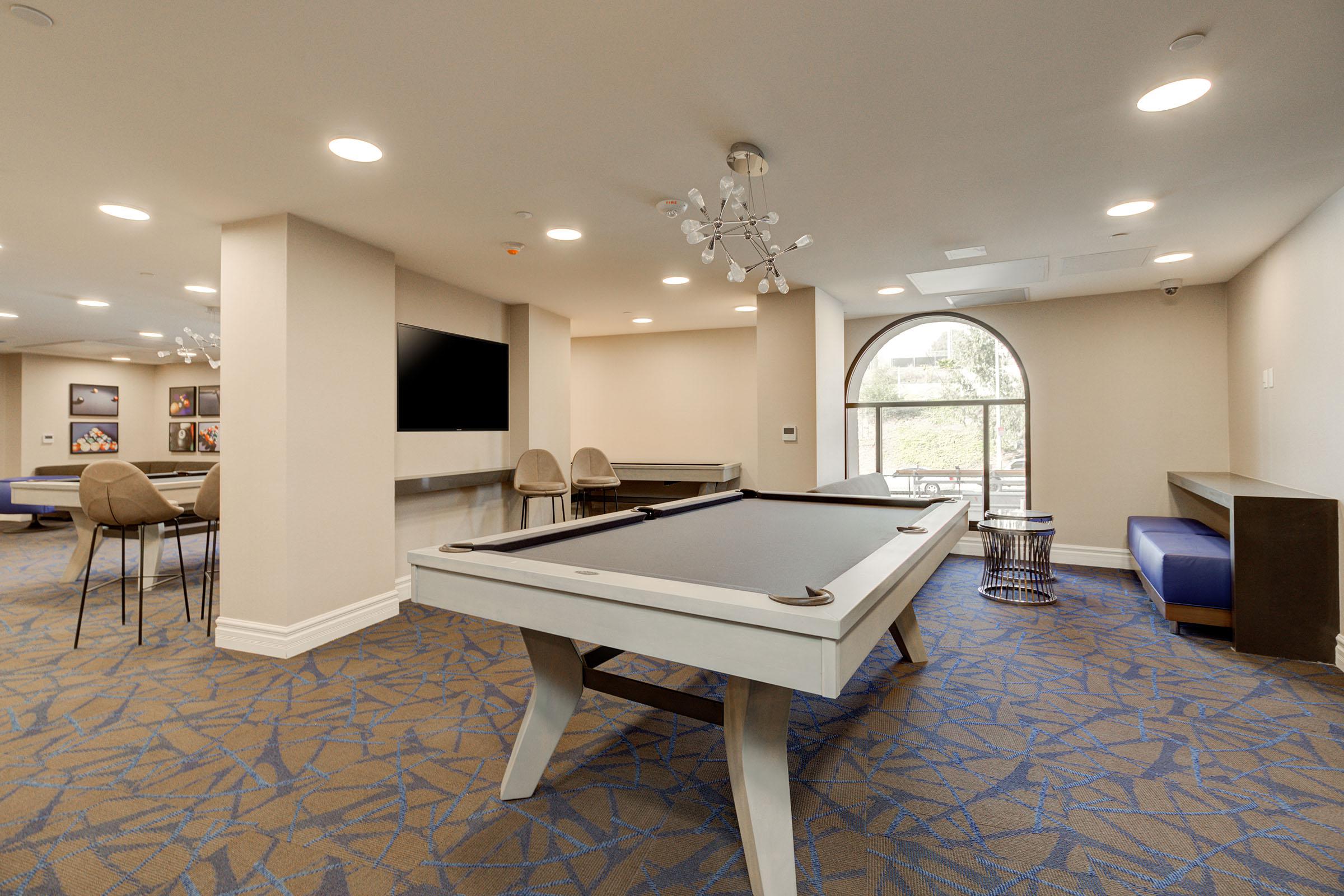 a room filled with furniture and a rug