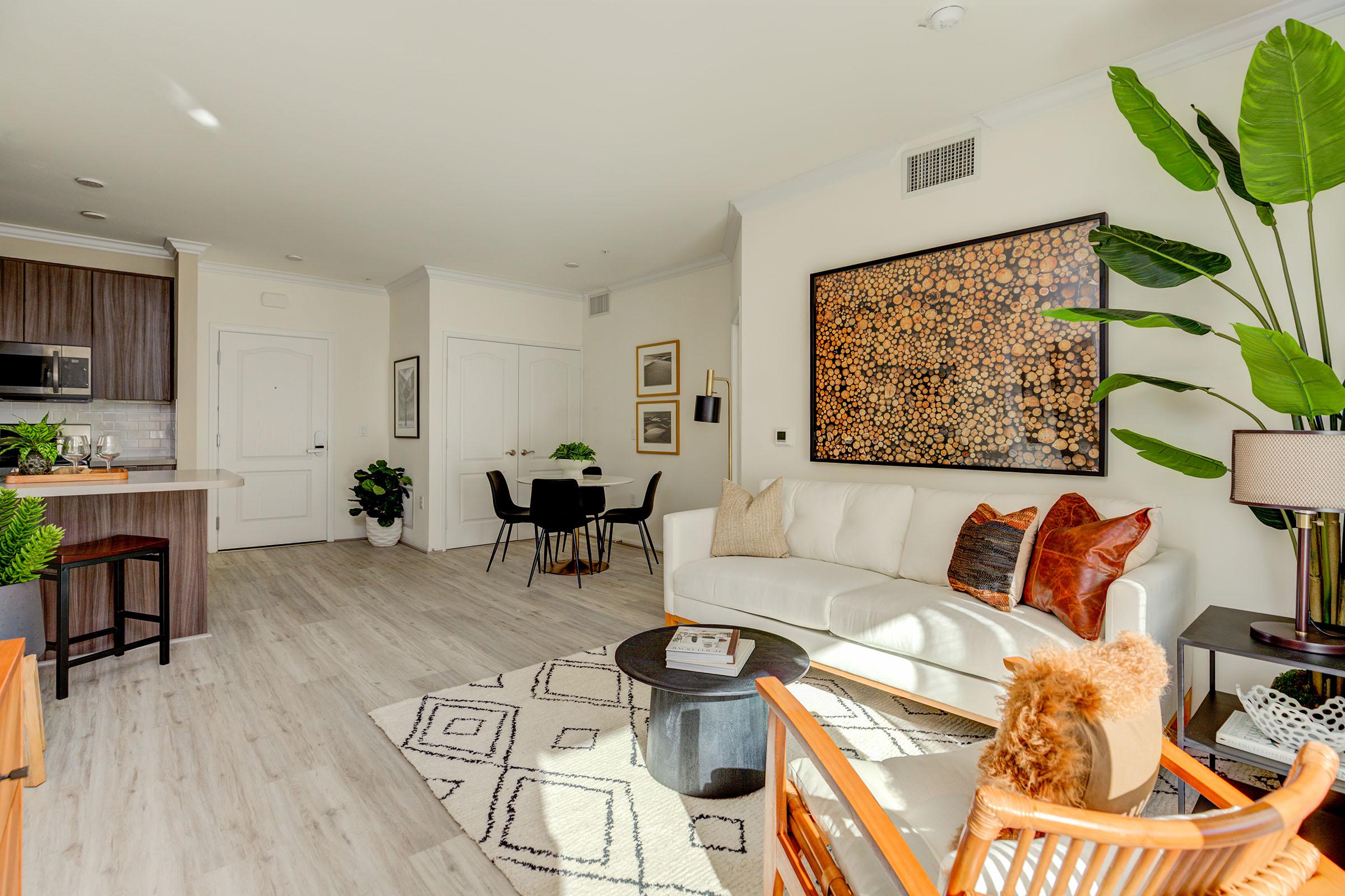 a living room filled with furniture and a fire place