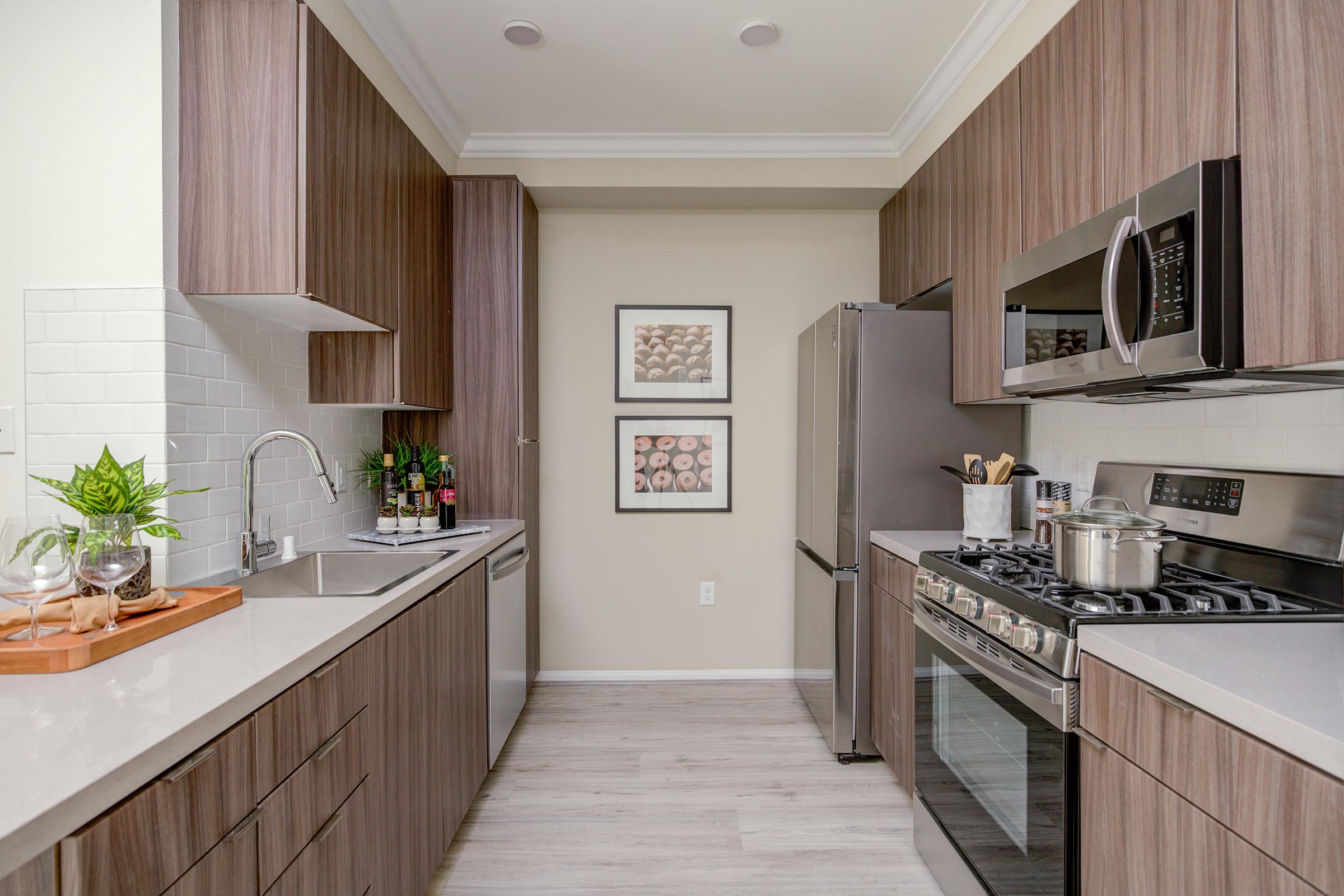 a kitchen with a sink and a window