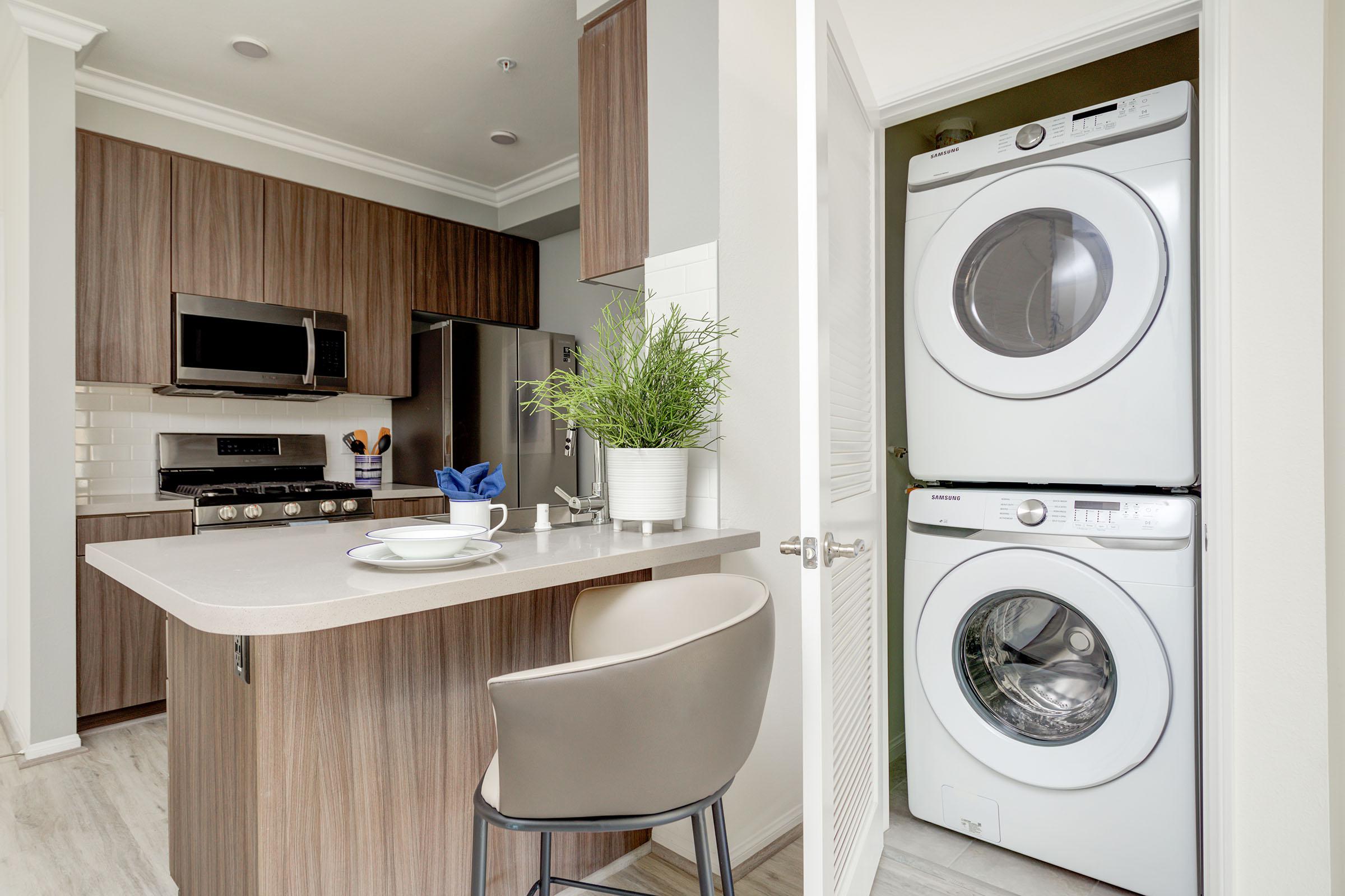 a kitchen with a sink and a microwave