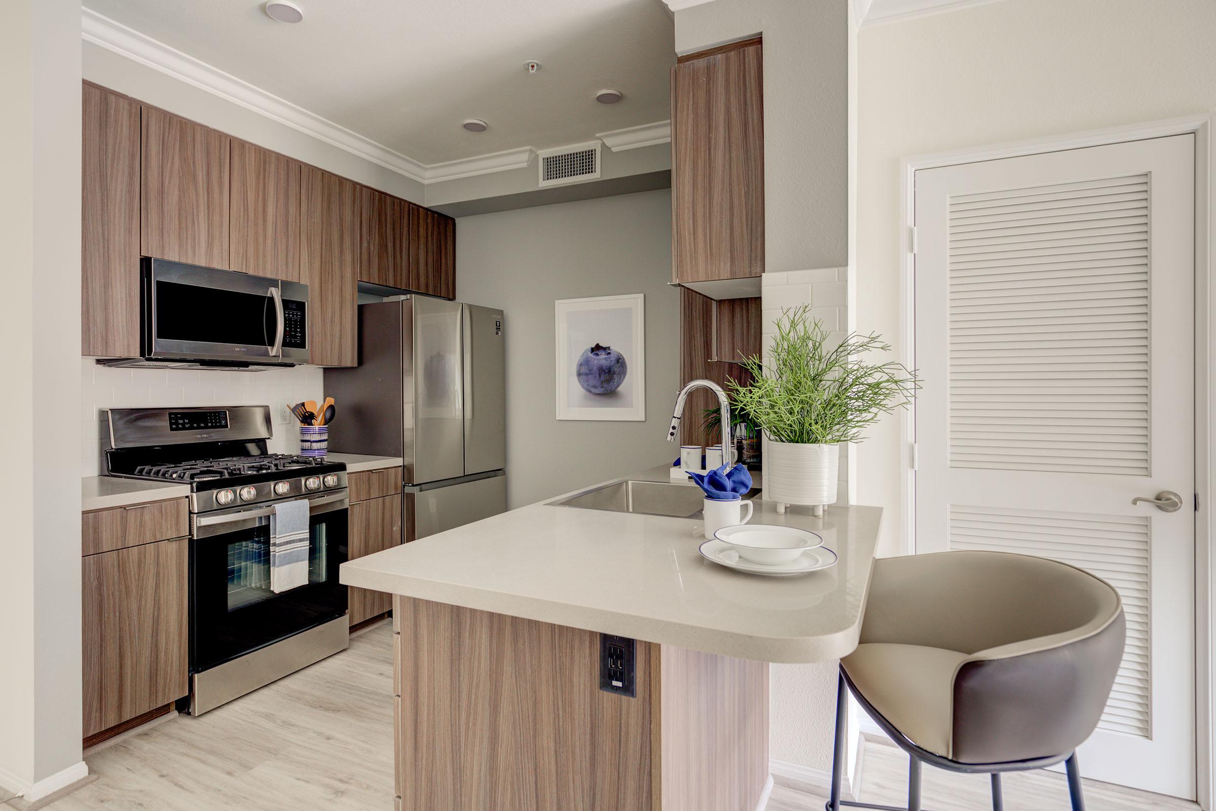 a kitchen with a sink and a window