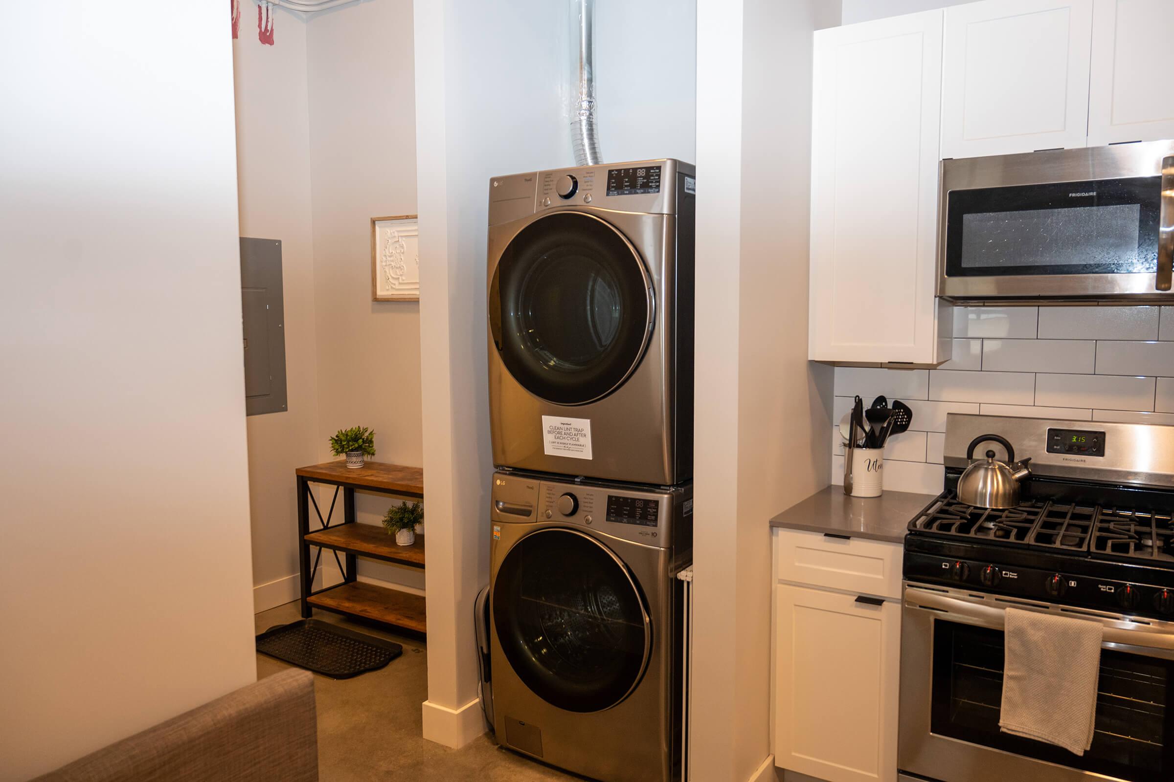 a microwave oven sitting on top of a stove