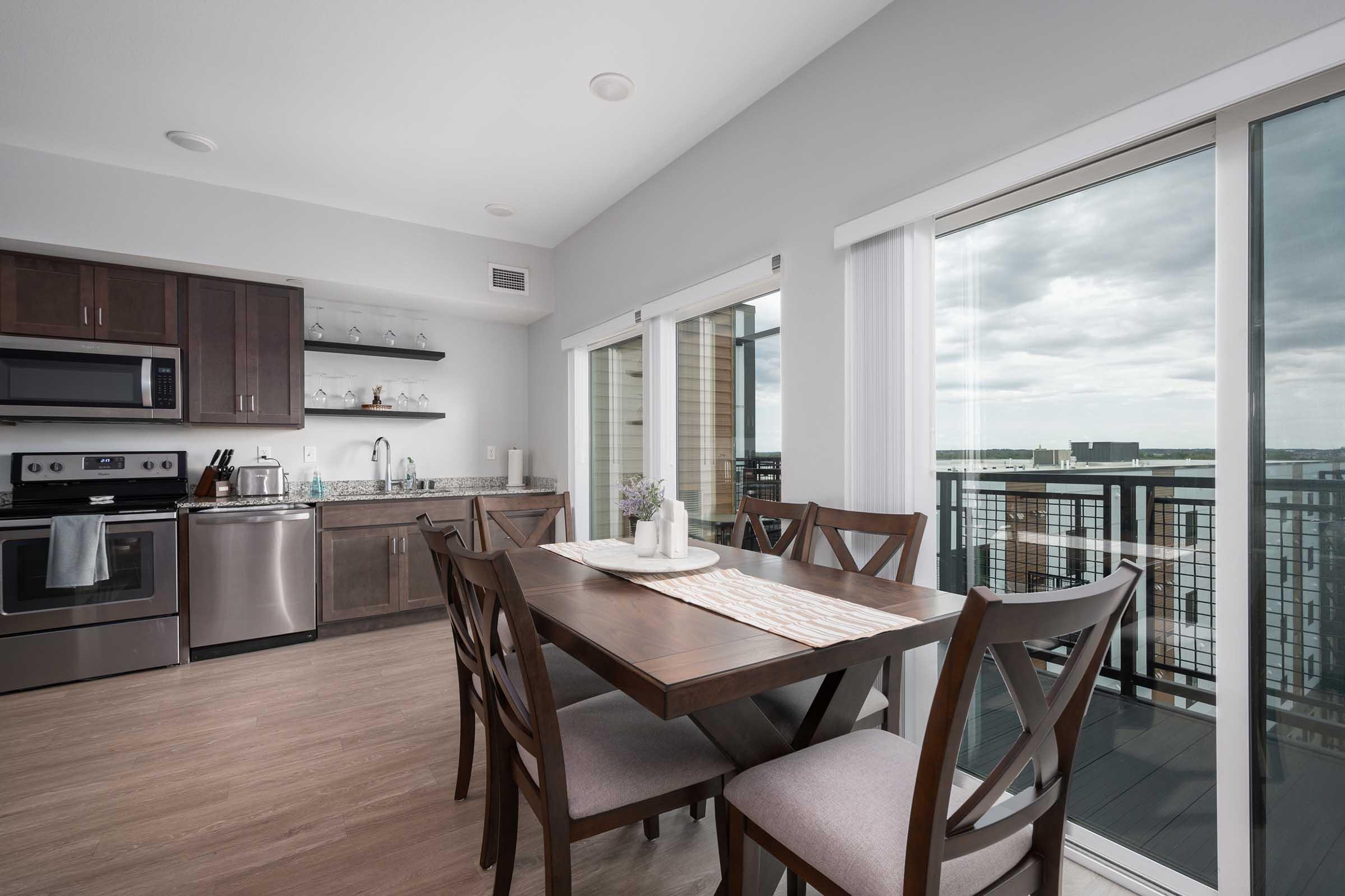 a room filled with furniture and a large window