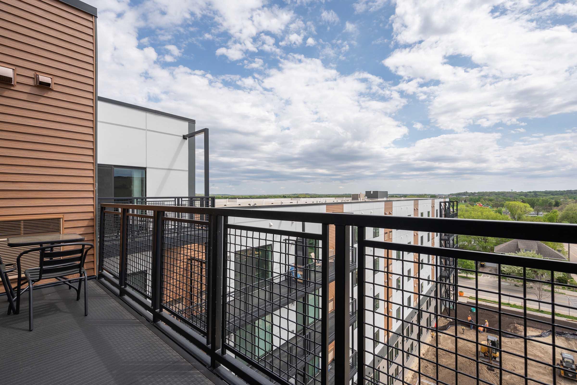 a building with a metal fence