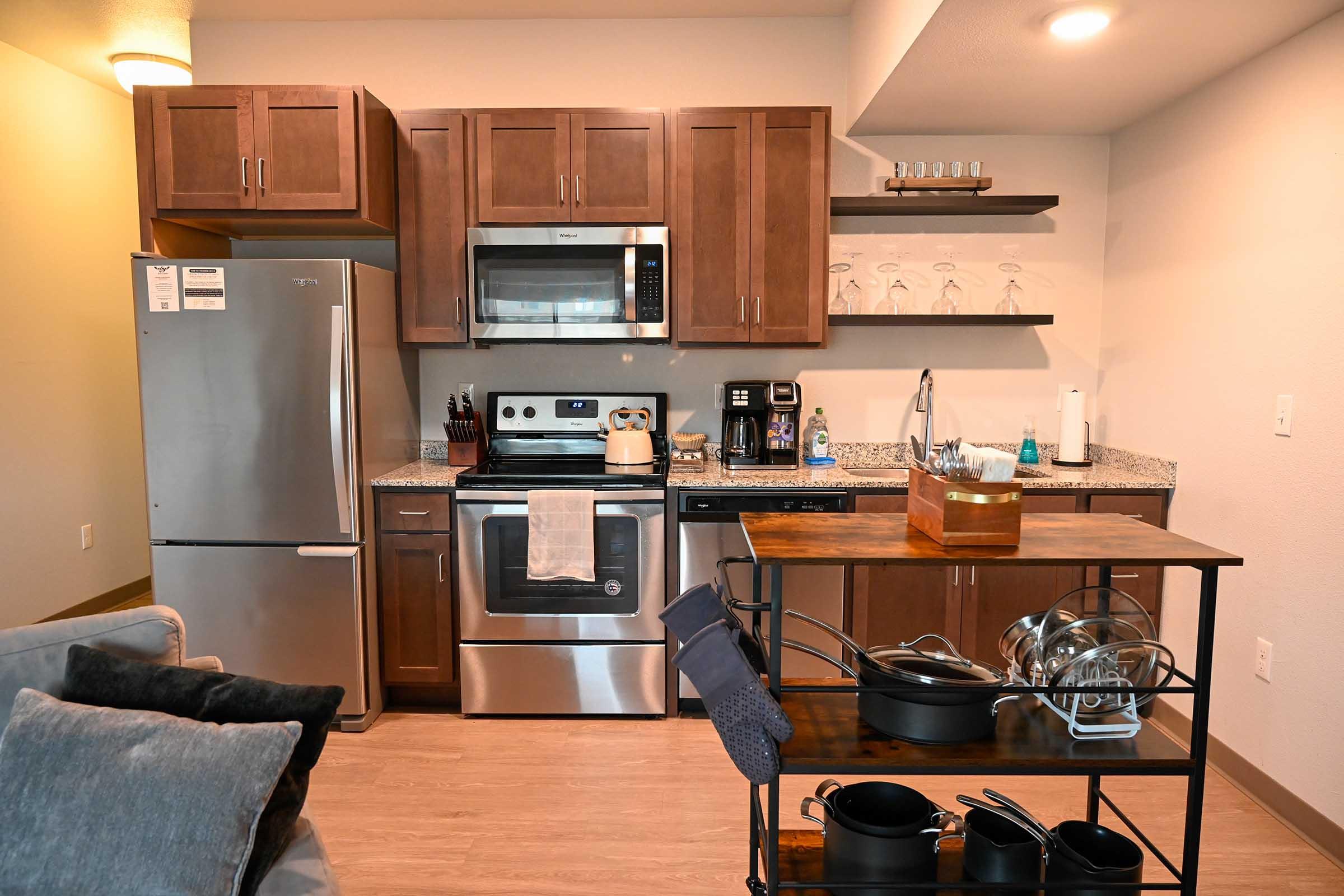 a kitchen with a table in a room