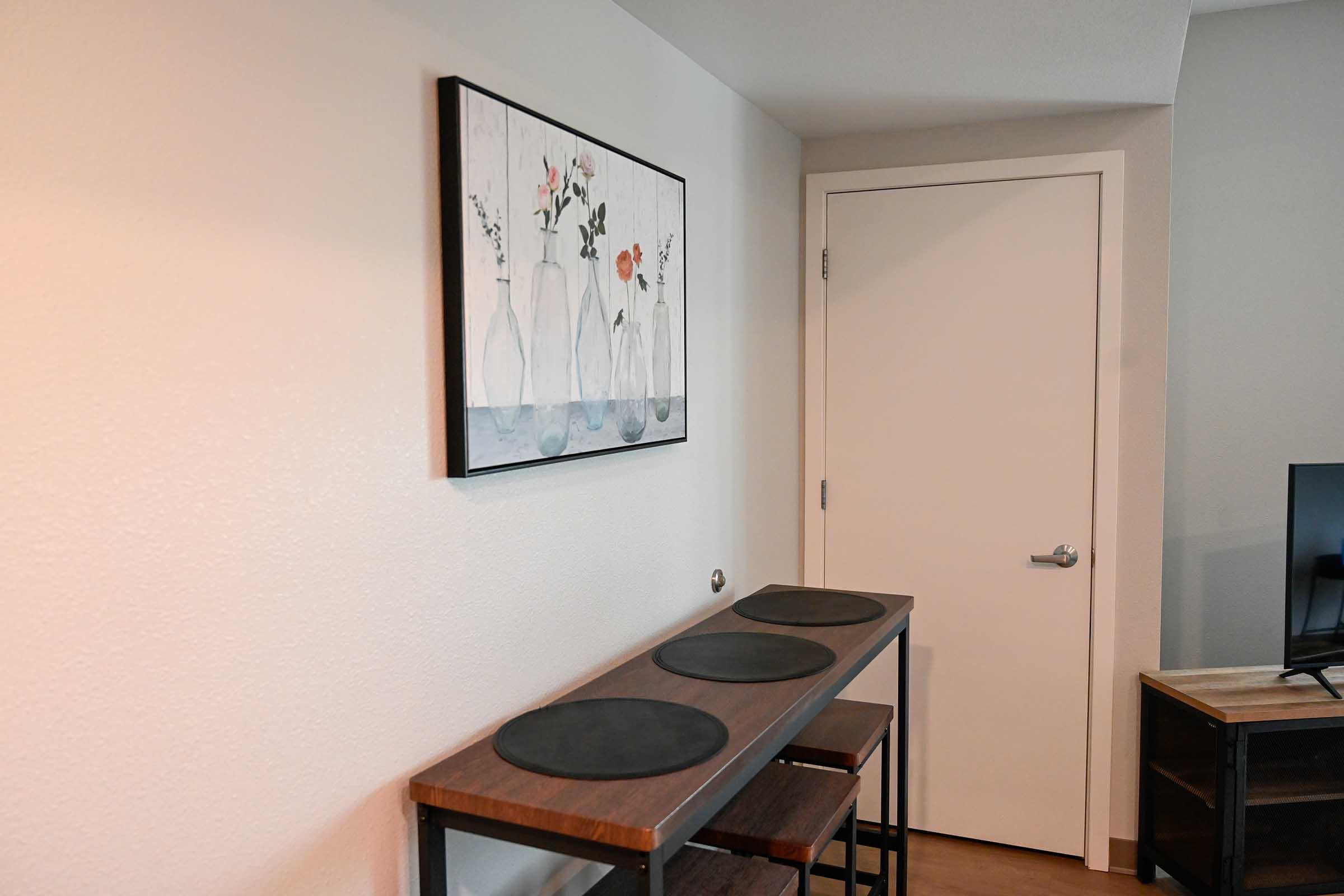 a kitchen with a table in a room