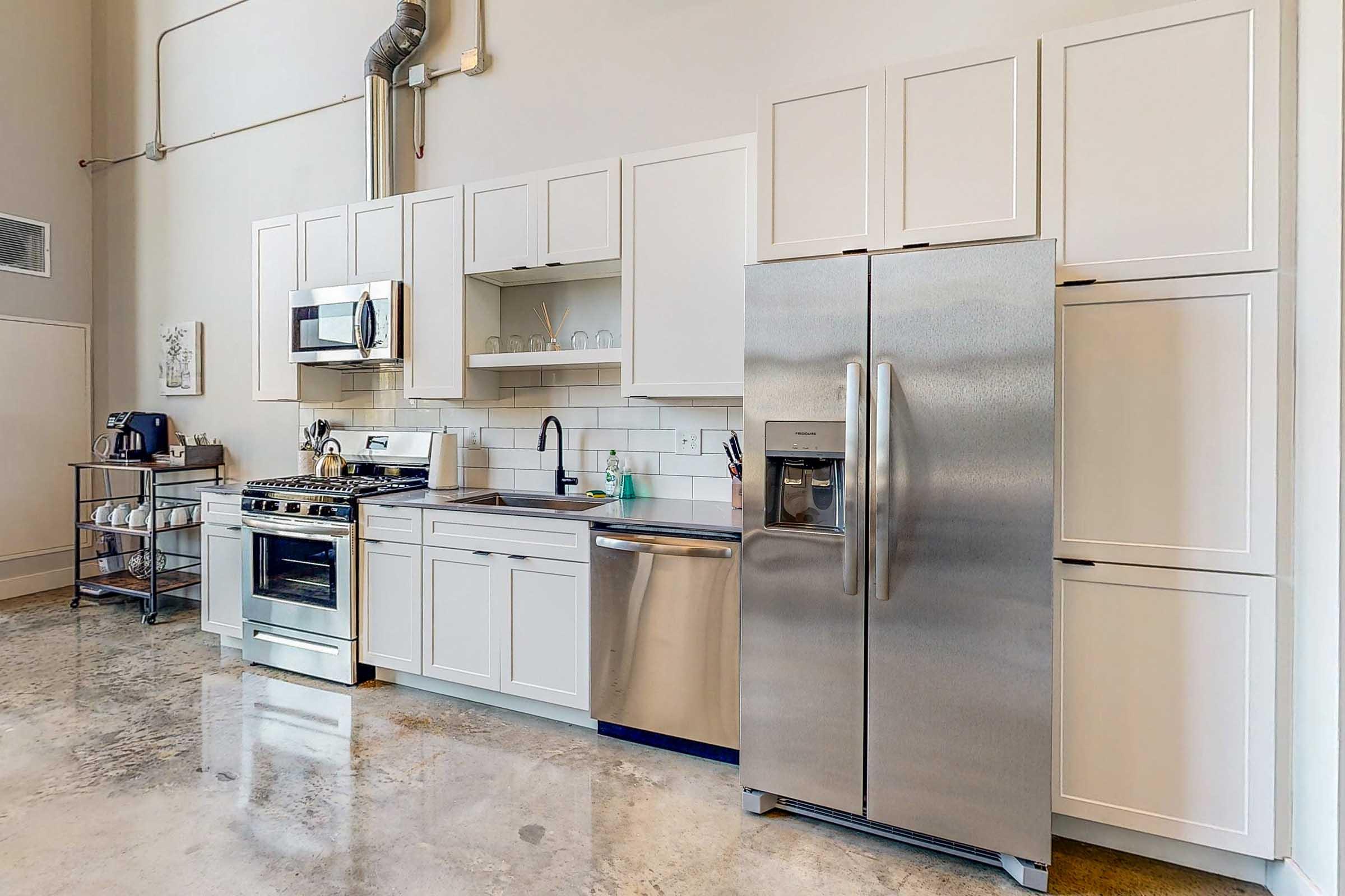 a stainless steel refrigerator in a kitchen