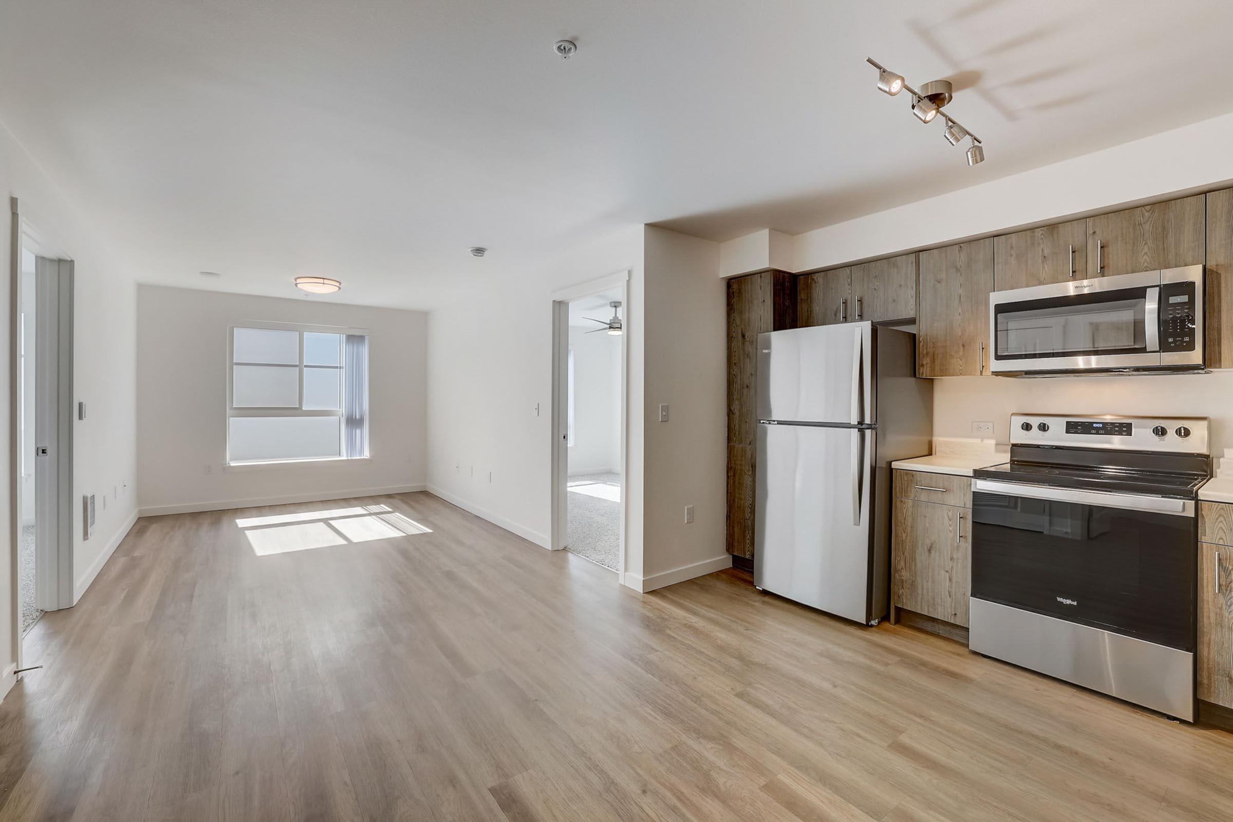 a kitchen with a wood floor