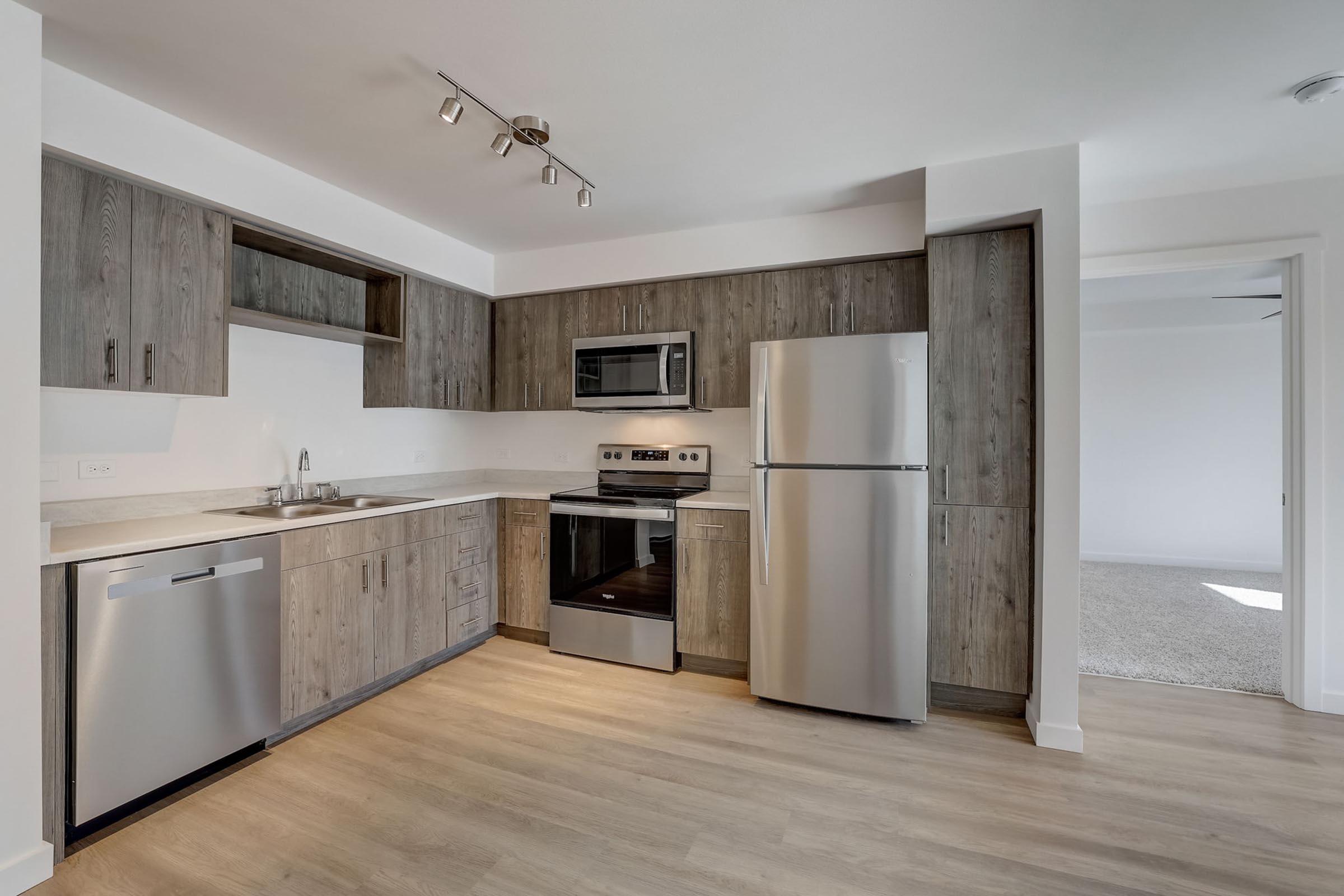 a stainless steel refrigerator in a kitchen