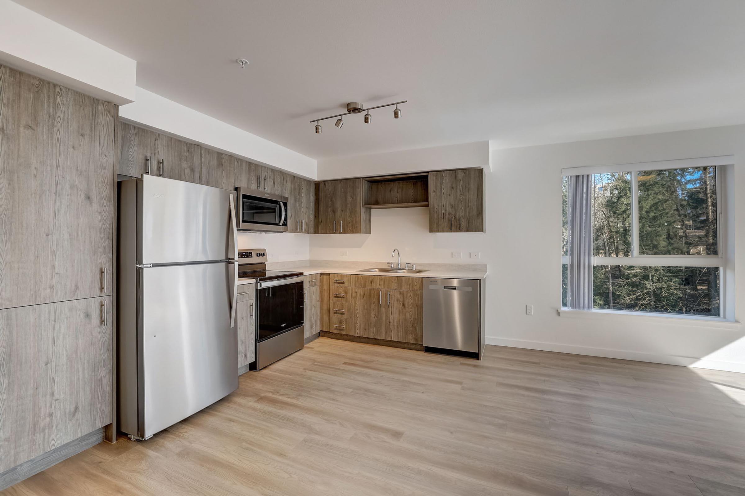 a kitchen with a wood floor