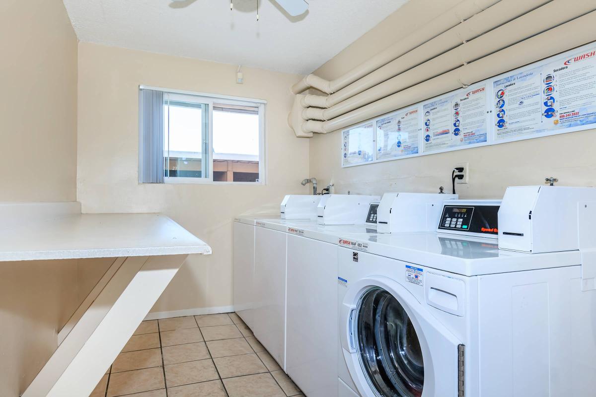 a kitchen with a sink and a microwave