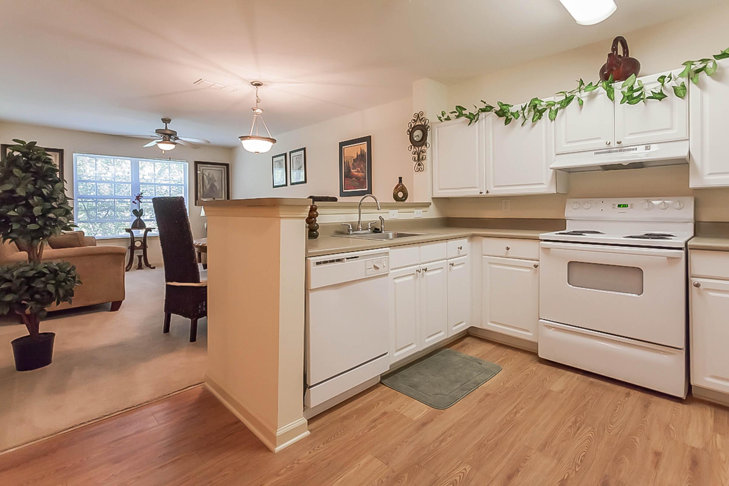 a living room filled with furniture and a stove