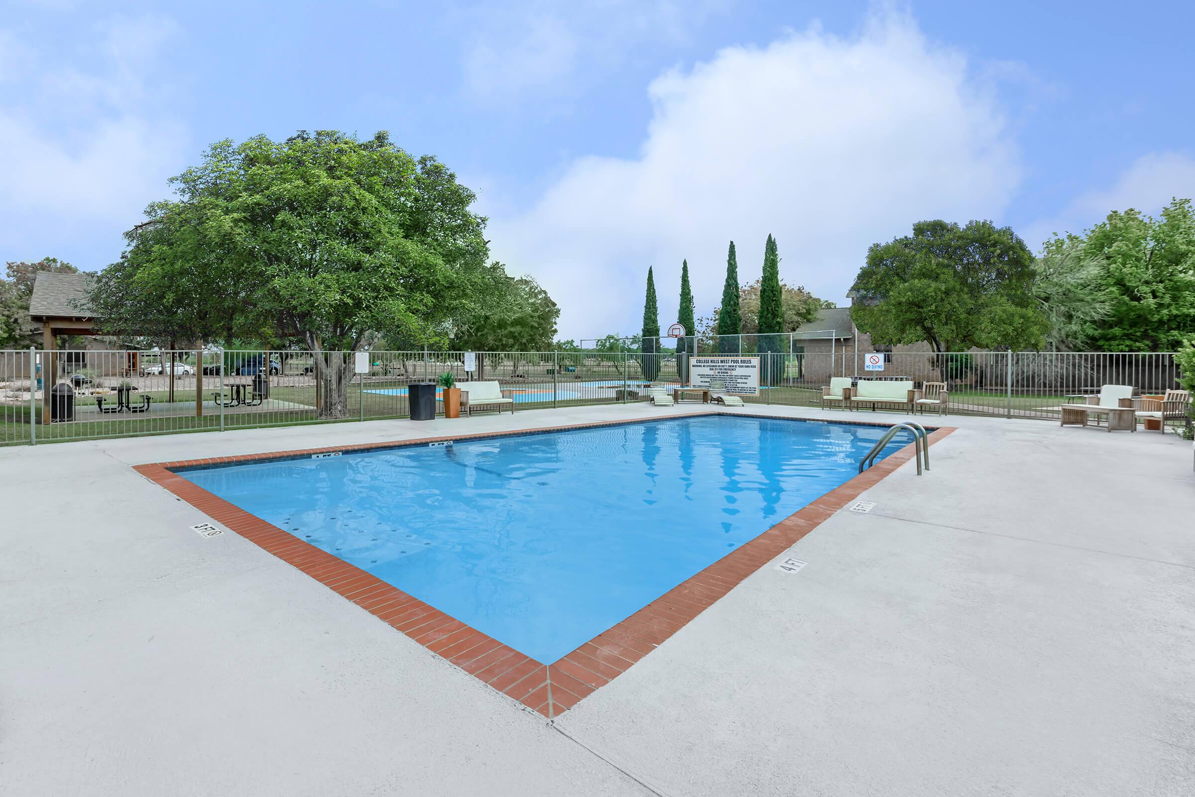 a pool next to a body of water