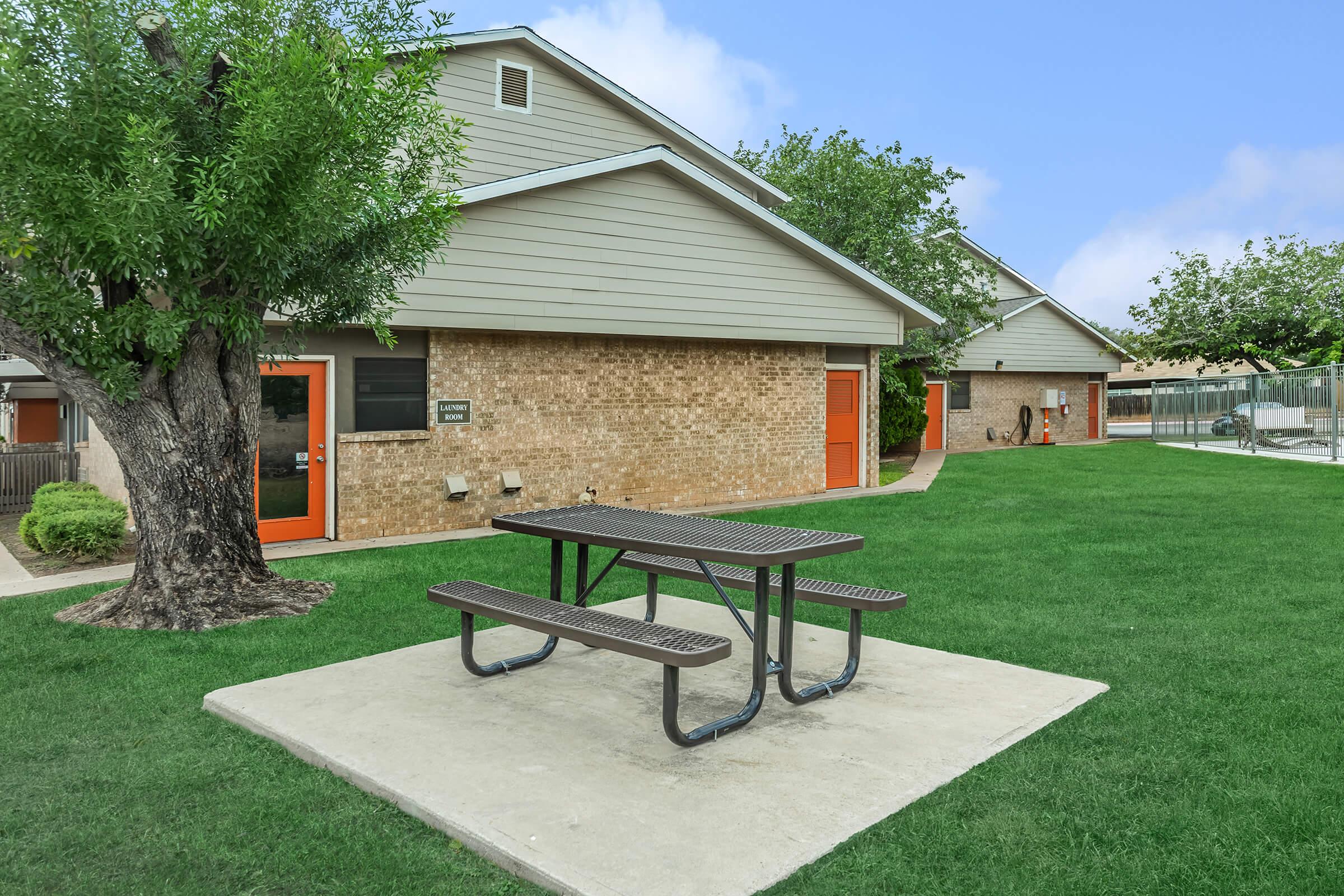 a large lawn in front of a house