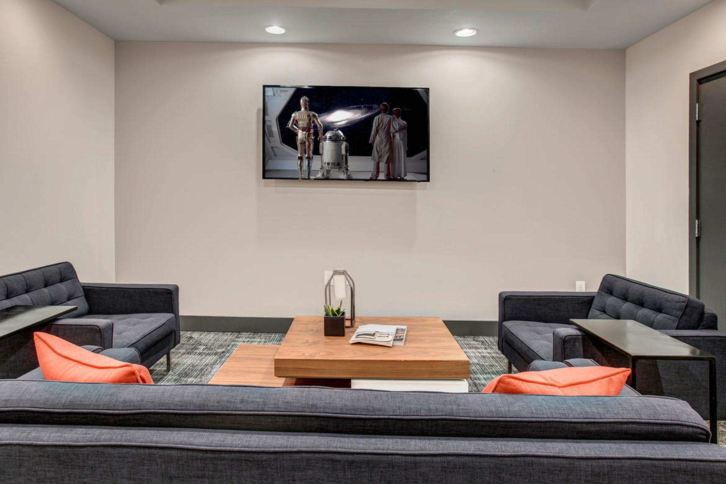 a living room with a large mirror