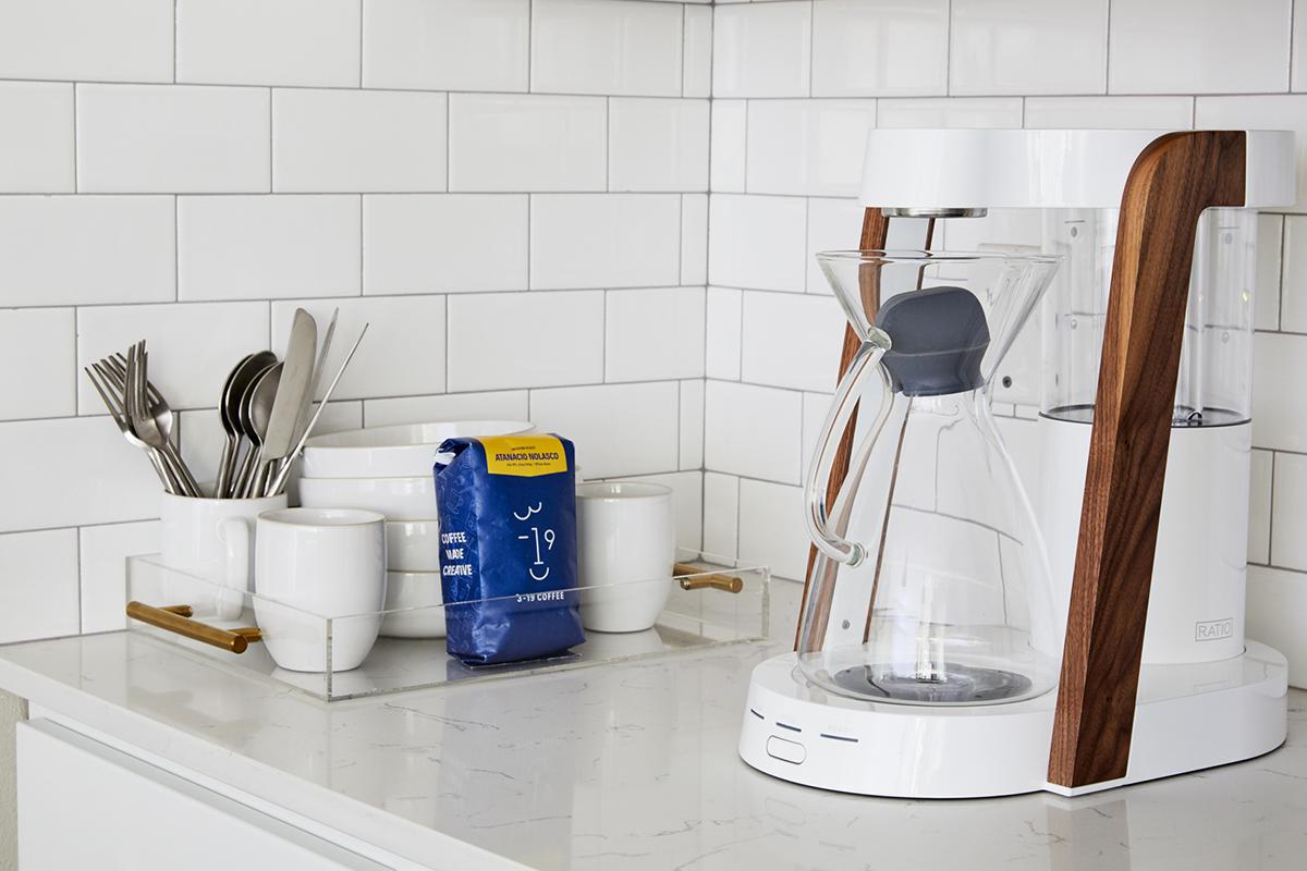 a kitchen with a stove and a sink